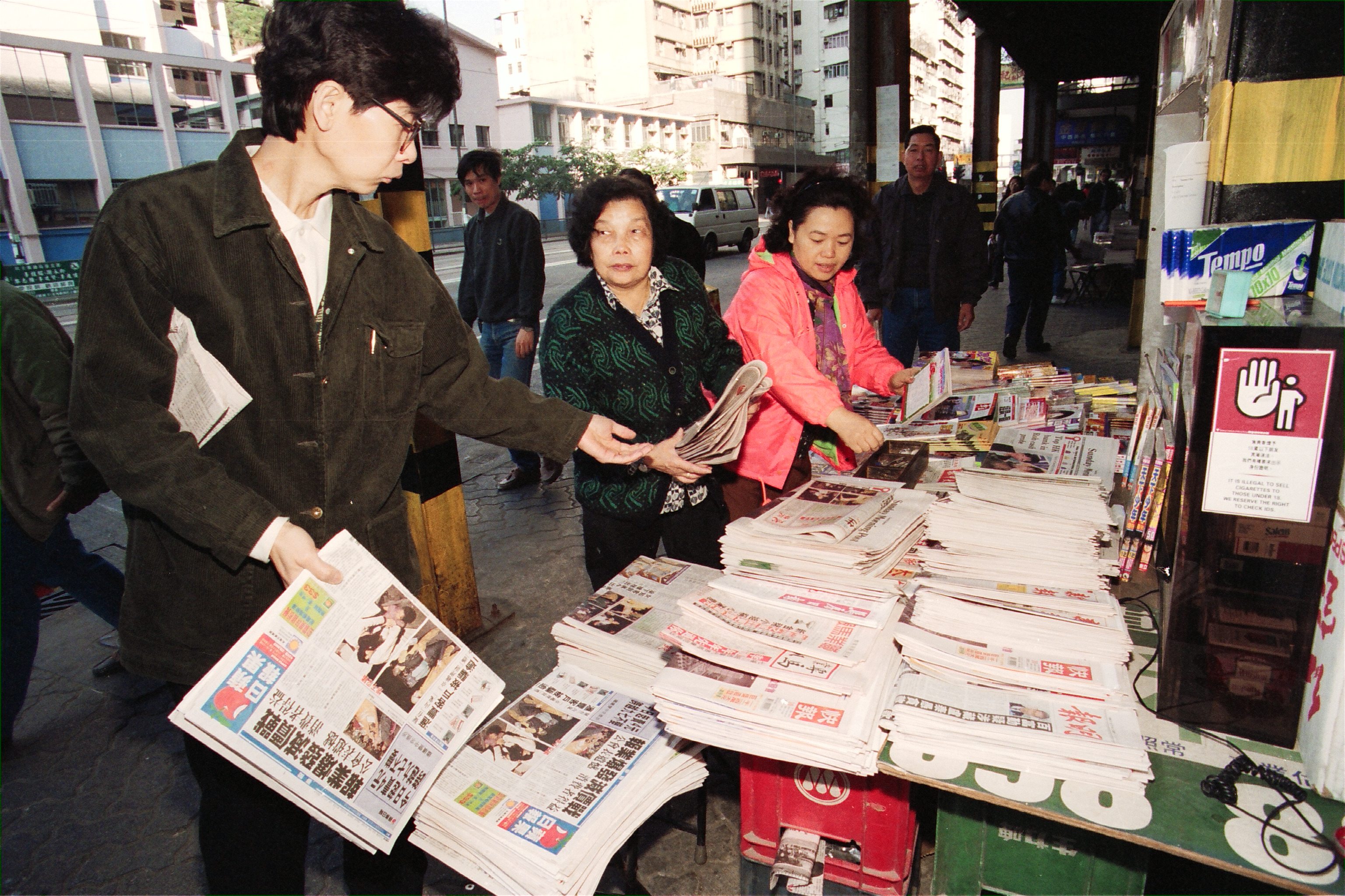 Chinese and Hong Kong newspapers being sold at a news stand. Photo: Staff