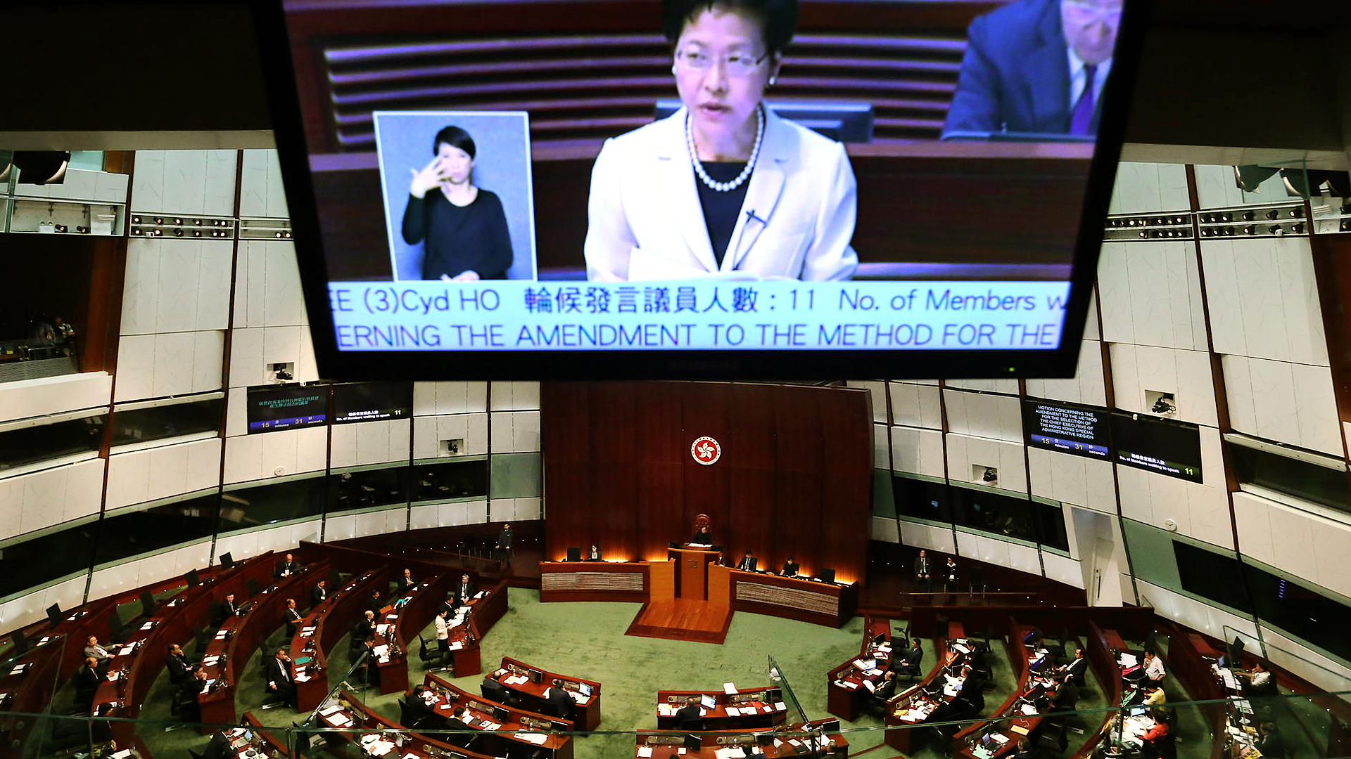 Chief Secretary Carrie Lam speaks at the legislature as debate over reform commences. Photo: K.Y. Cheng