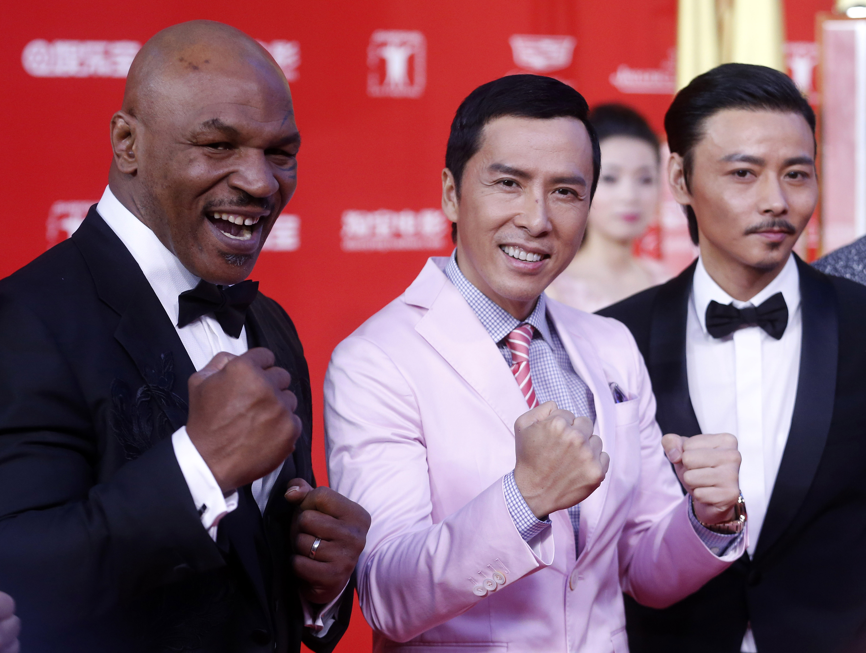 Leading cast members of the movie "Ip Man 3" including Donnie Yen (centre) and Mike Tyson at the 18th Shanghai International Film Festival last week. Photo: TNS