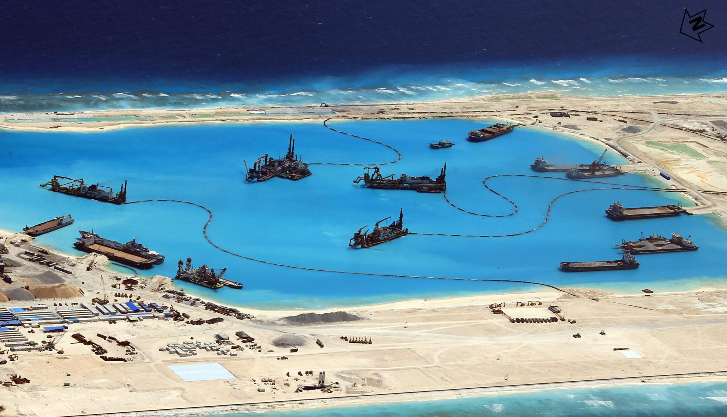 China has defended its work on islands in the Spratlys chain, saying the construction and land reclamation is designed to improve weather forecasts. Photo: EPA