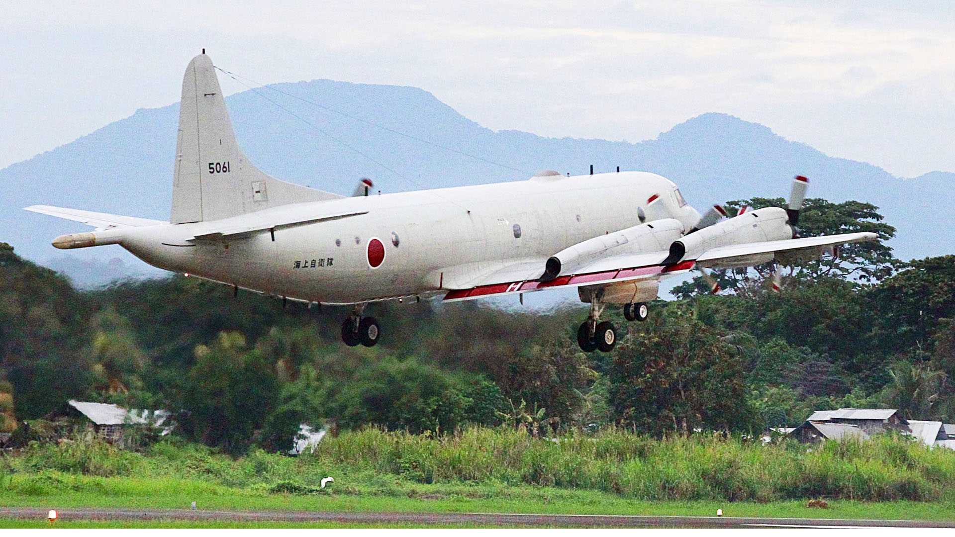 A Japanese Maritime Self-Defence Force P-3C patrol plane takes off from an airport in Puerto Princesa on Palawan Island in the western Philippines on Tuesday, to participate in joint exercises with Philippine forces in the face of China's growing assertiveness in the South China Sea. Photo: Kyodo