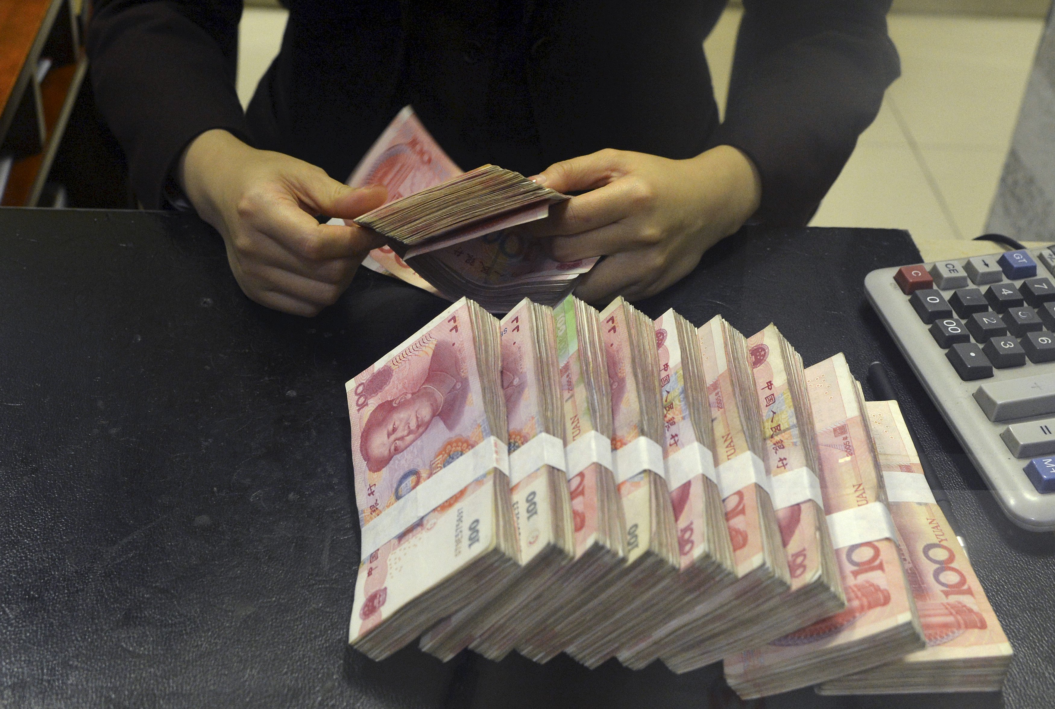 Yuan short sellers working on the assumption that monetary policy easing is around the corner may need a change of plan. Photo: Reuters 