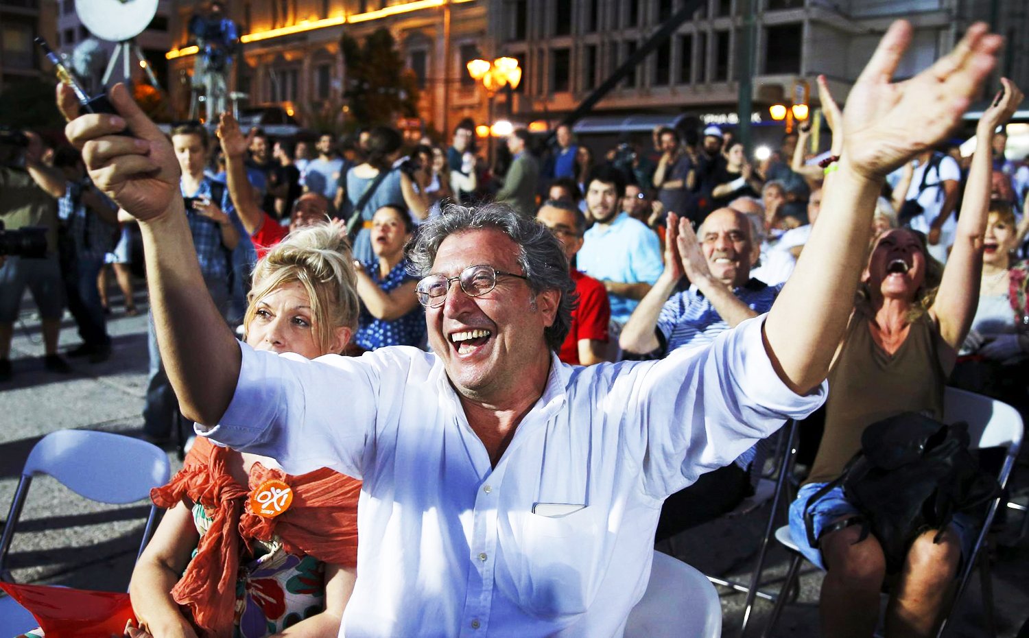 Voters celebrate the results of the referendum in Athens after a decisive majority rejected more austerity. Photo: Reuters