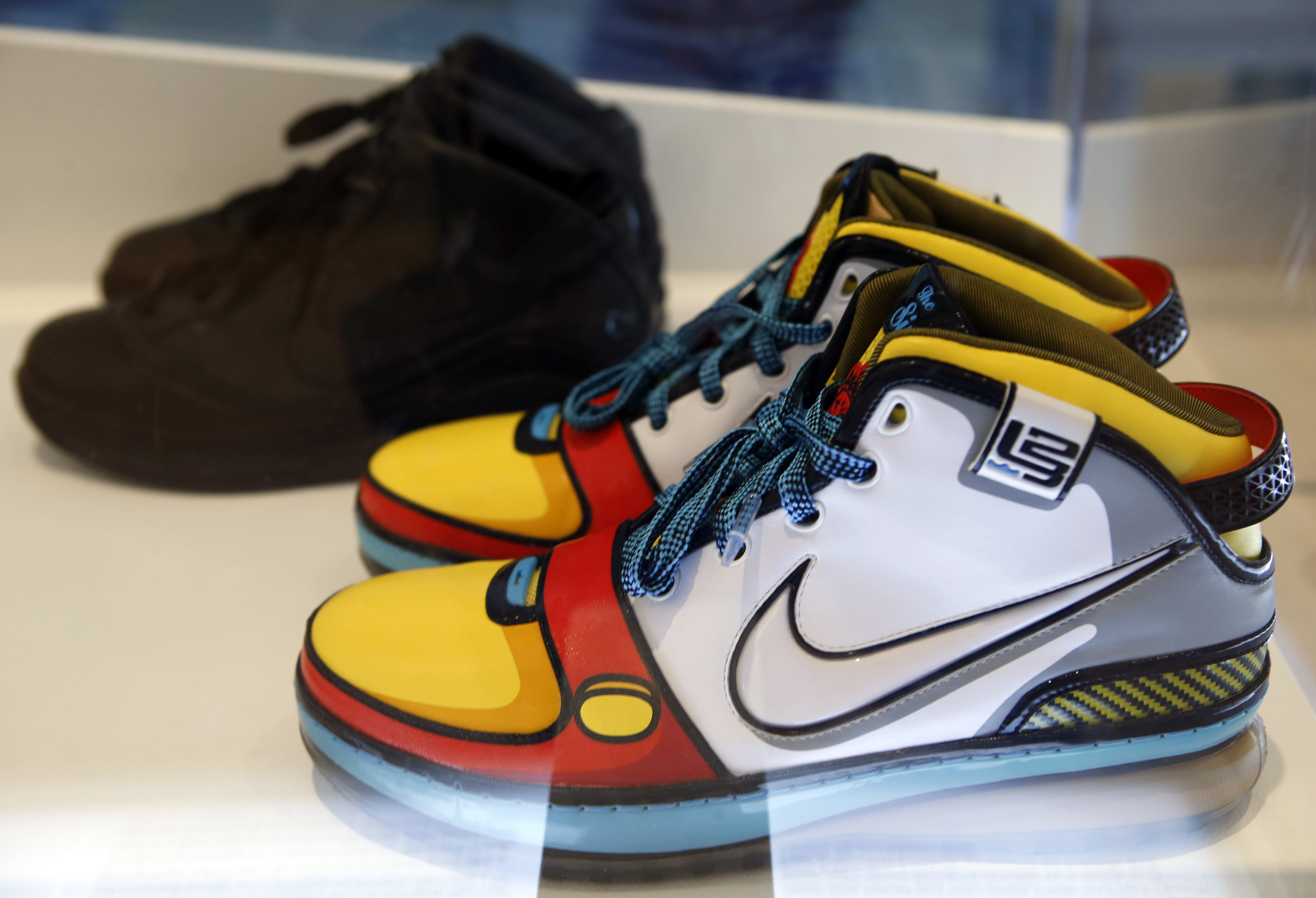 Bold graphics and cartoon-like colours are featured on a rare pair of 2009 sneakers, inspired by Stewie Griffin, LeBron James's favourite character from the animated television show Family Guy, displayed as part of the Out of the Box: The Rise of Sneaker Culture exhibition. 