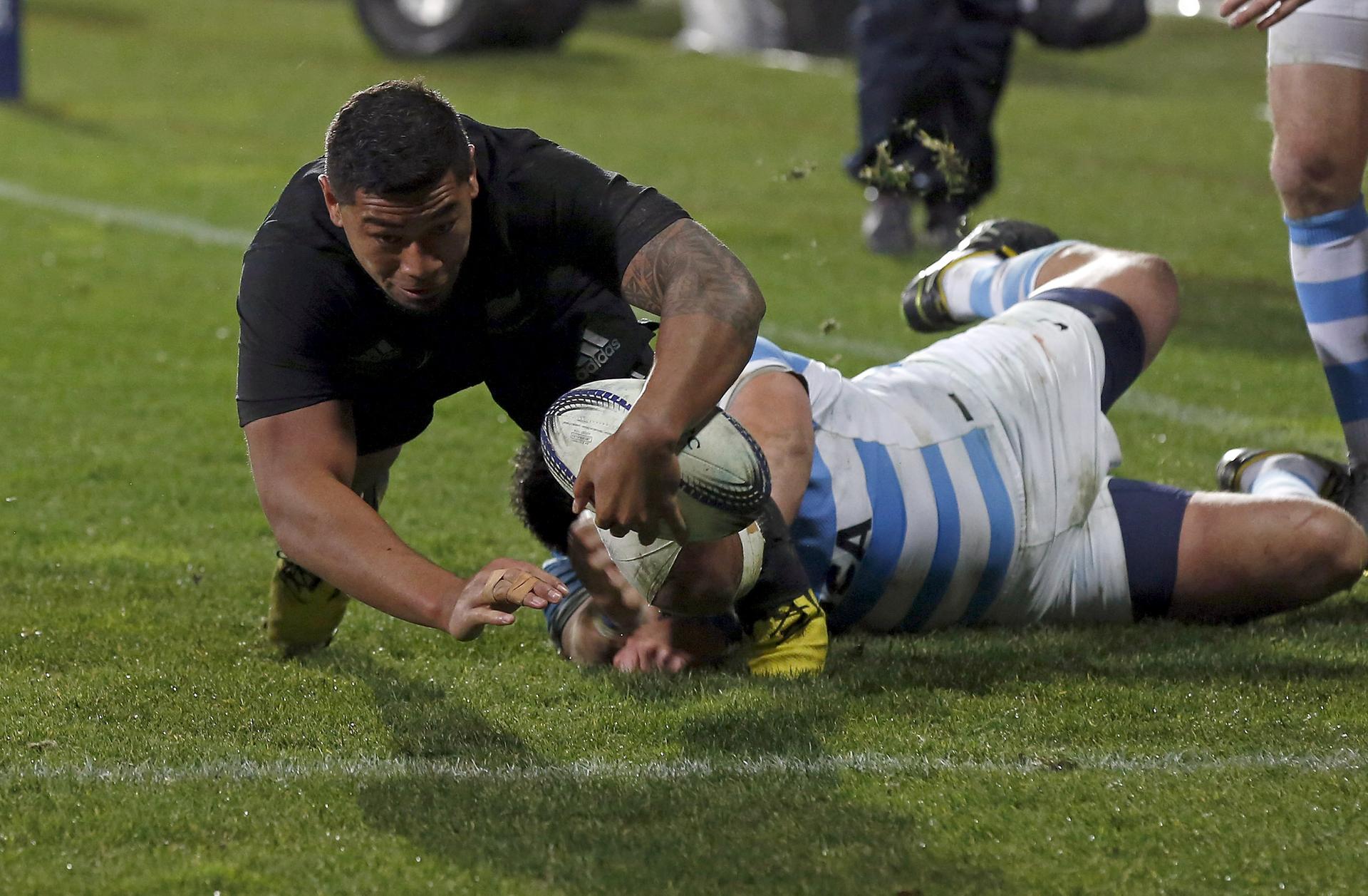 Charles Piutau scores for the All Blacks in their 39-18 win over Argentina in the 2015 Rugby Championship opener in Christchurch. Photo: Reuters
