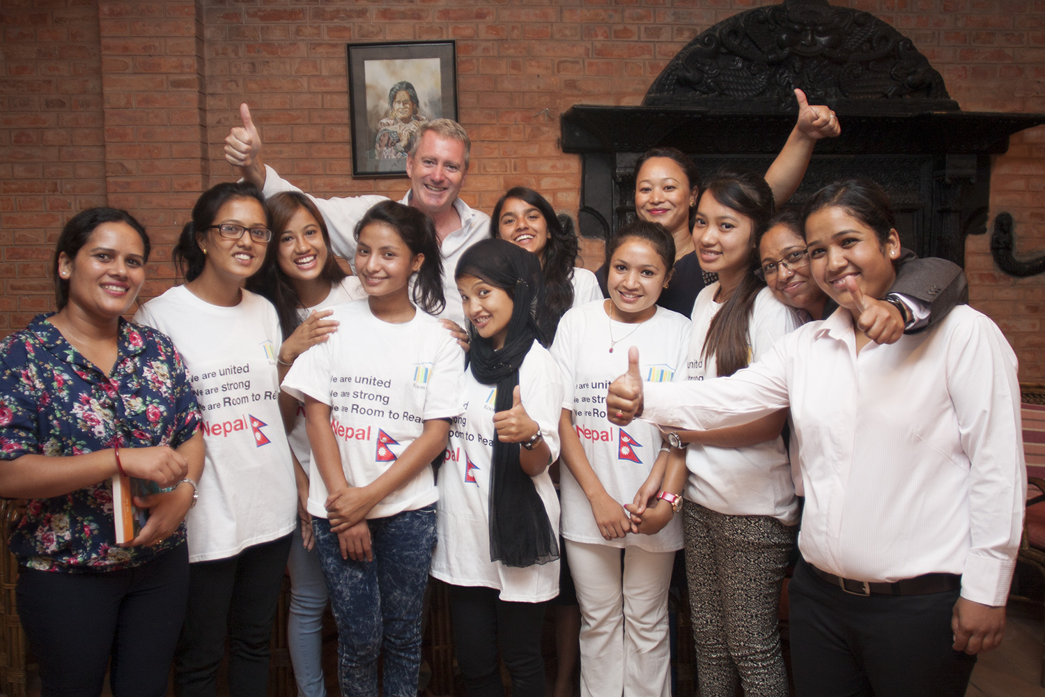 John Wood meets members of Room to Read's girls' education programme and Nepal office staff after his tour of quake-affected districts. Photo: Rishi Amatya/Room to Read
