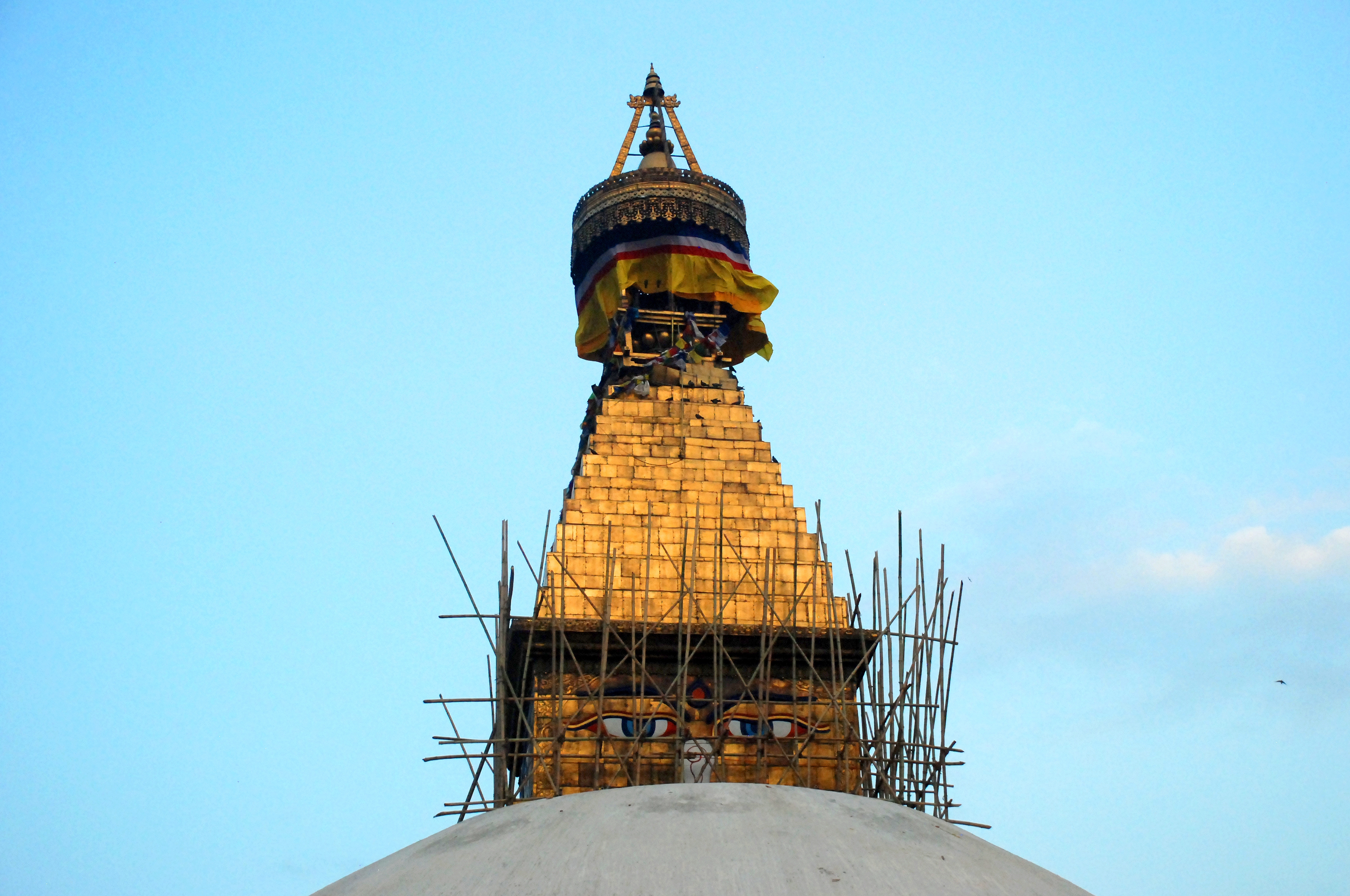 Scaffolding surrounding the damaged Boudha Stupa, Kathmandu, Nepal, after the second Nepal earthquake on May 12 damaged the structure. Photo: Ingrid Piper