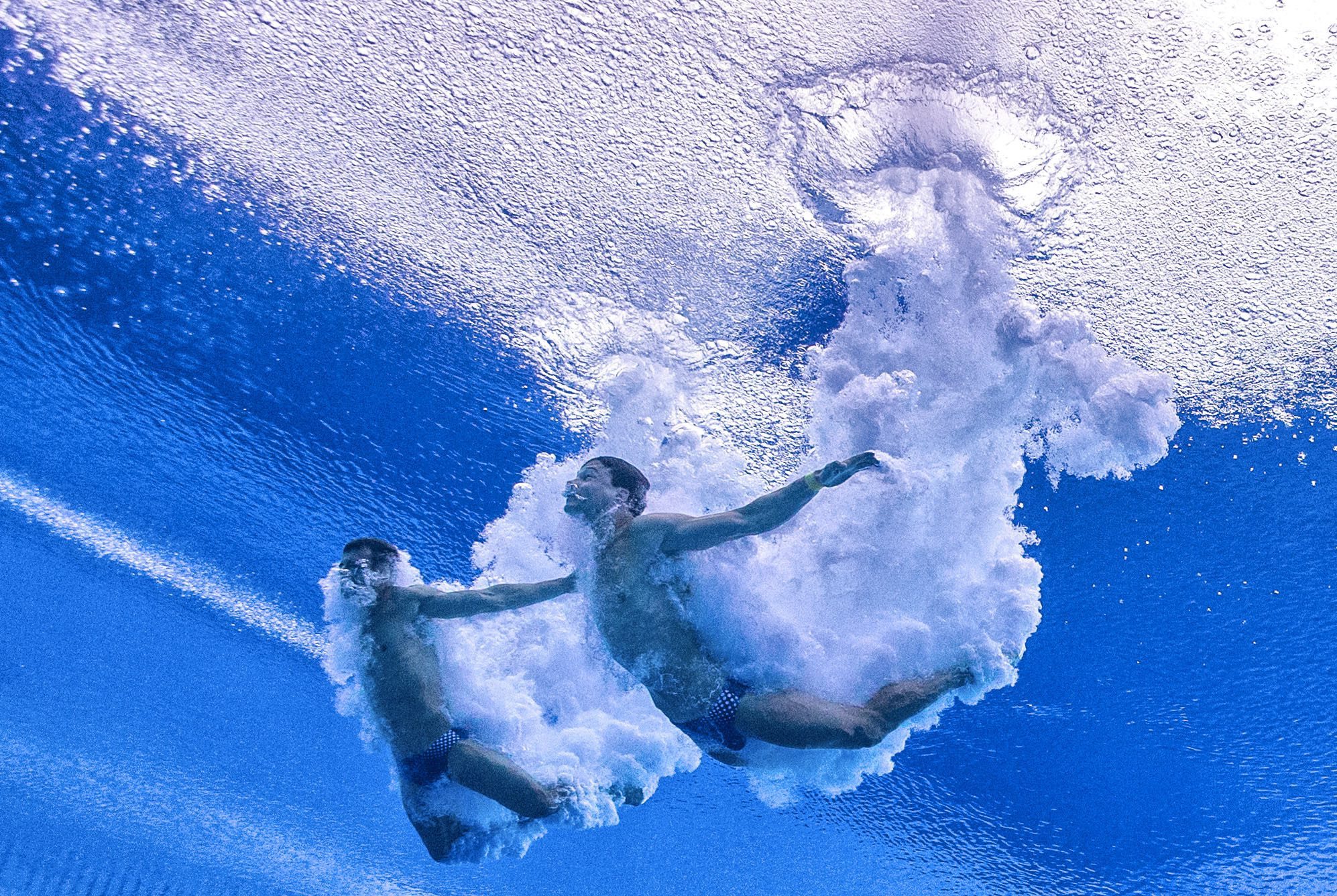 Sascha Klein and Patrick Hausding of Germany perform during the Men's 10-metre synchro platform diving final at the 15th FINA swimming world championships in Spain in 2013. Photo: EPA