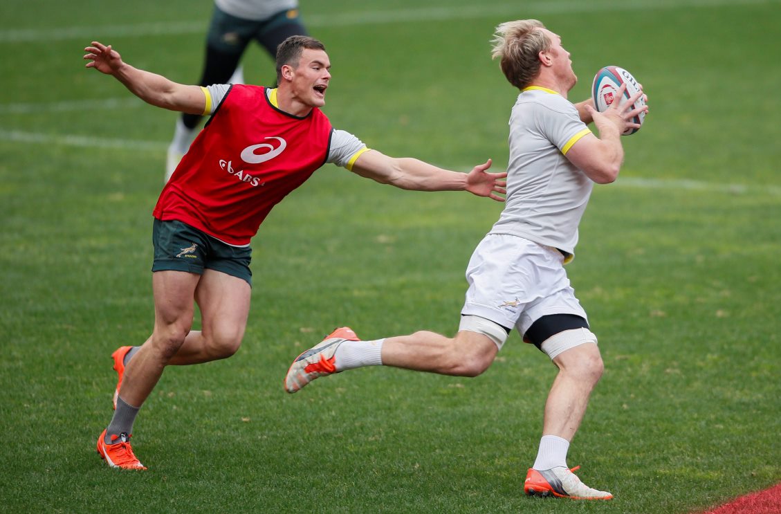 South Africa captain Schalk Burger is chased by young team-mate Jesse Kriel during the captain's run in Johannesburg on Friday. The Boks face off against current world champions New Zealand on Saturday. Photos: EPA