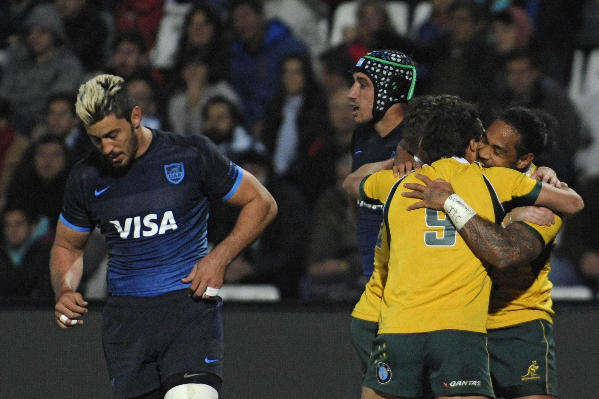 Wallaby Joe Tomane celebrates scoring a try in the win over Argentina. Photo: AFP