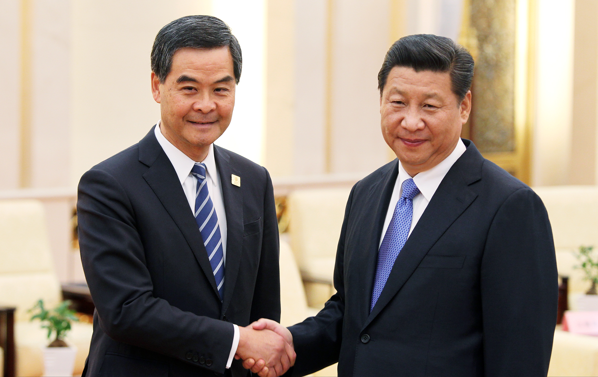 Chinese president Xi Jinping (right) meets Hong Kong Chief Executive Leung Chun-ying in the Great Hall of the People in Beijing in 2014. Photo: Simon Song