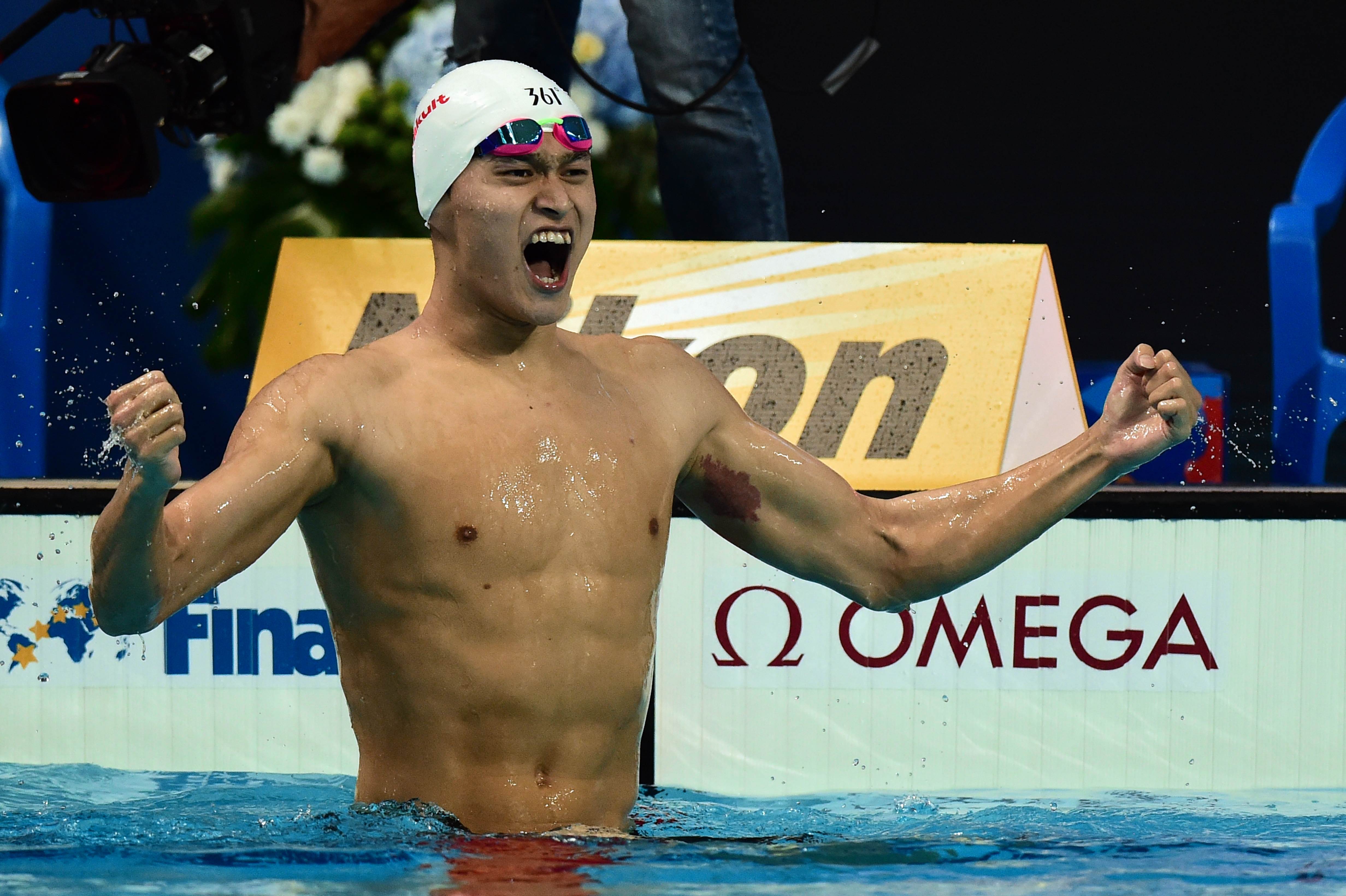 China's Sun Yang celebrates defending his 400m freestyle title at the world championships in Kazan. Photo: AFP