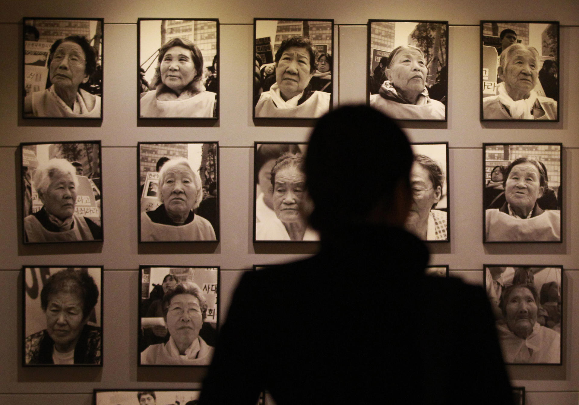 Photos of former "comfort women" are a reminder of the slavery in which Japanese soldiers engaged at locations it occupied during the second world war. Photo: AP