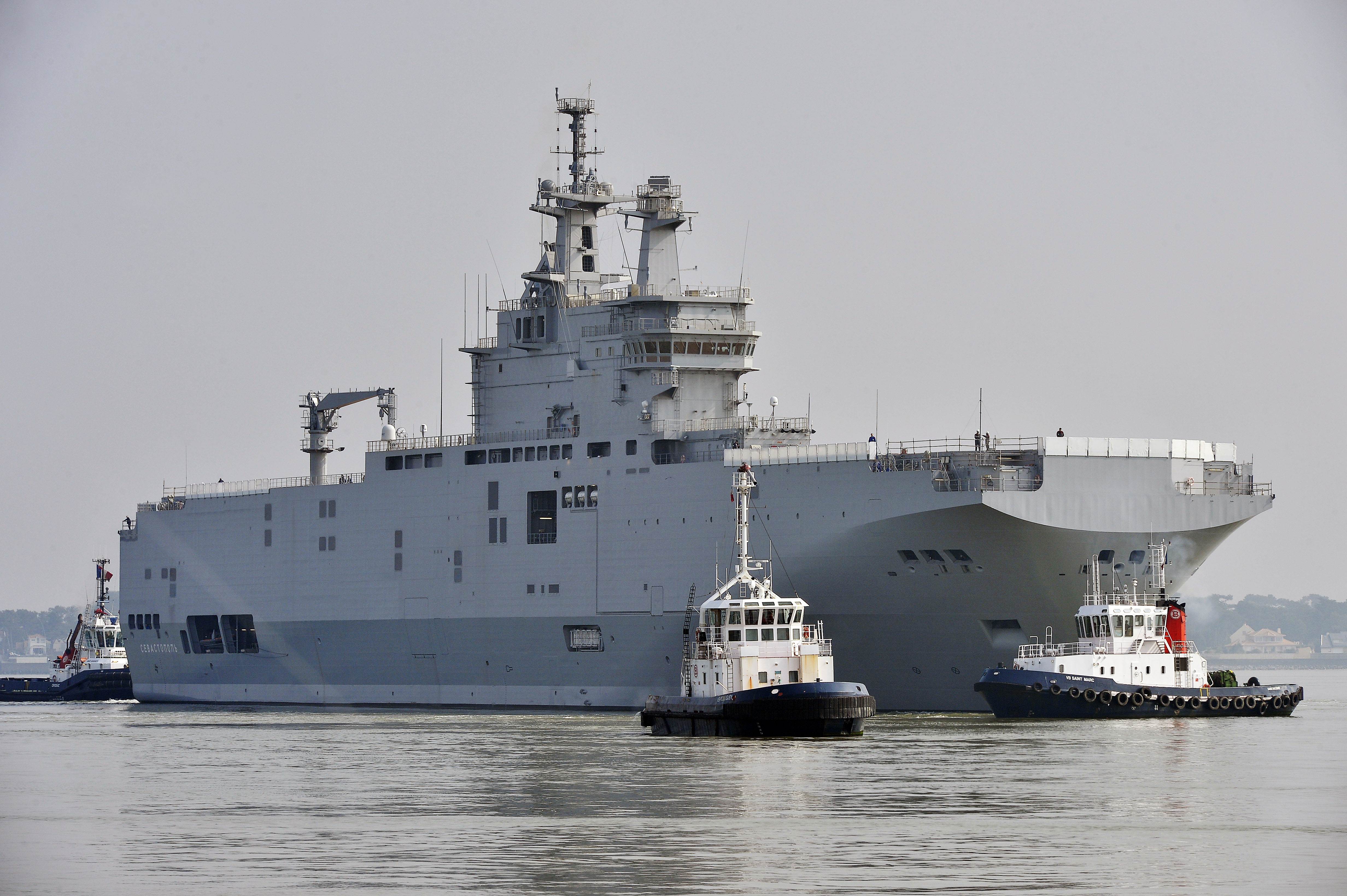 This file photo taken in March off Saint-Nazaire, northwestern France, shows a  Mistral-class warship on its way for its first sea trials. The deal to sell the ship and a sister vessel to Russia has fallen through. Photo: AFP