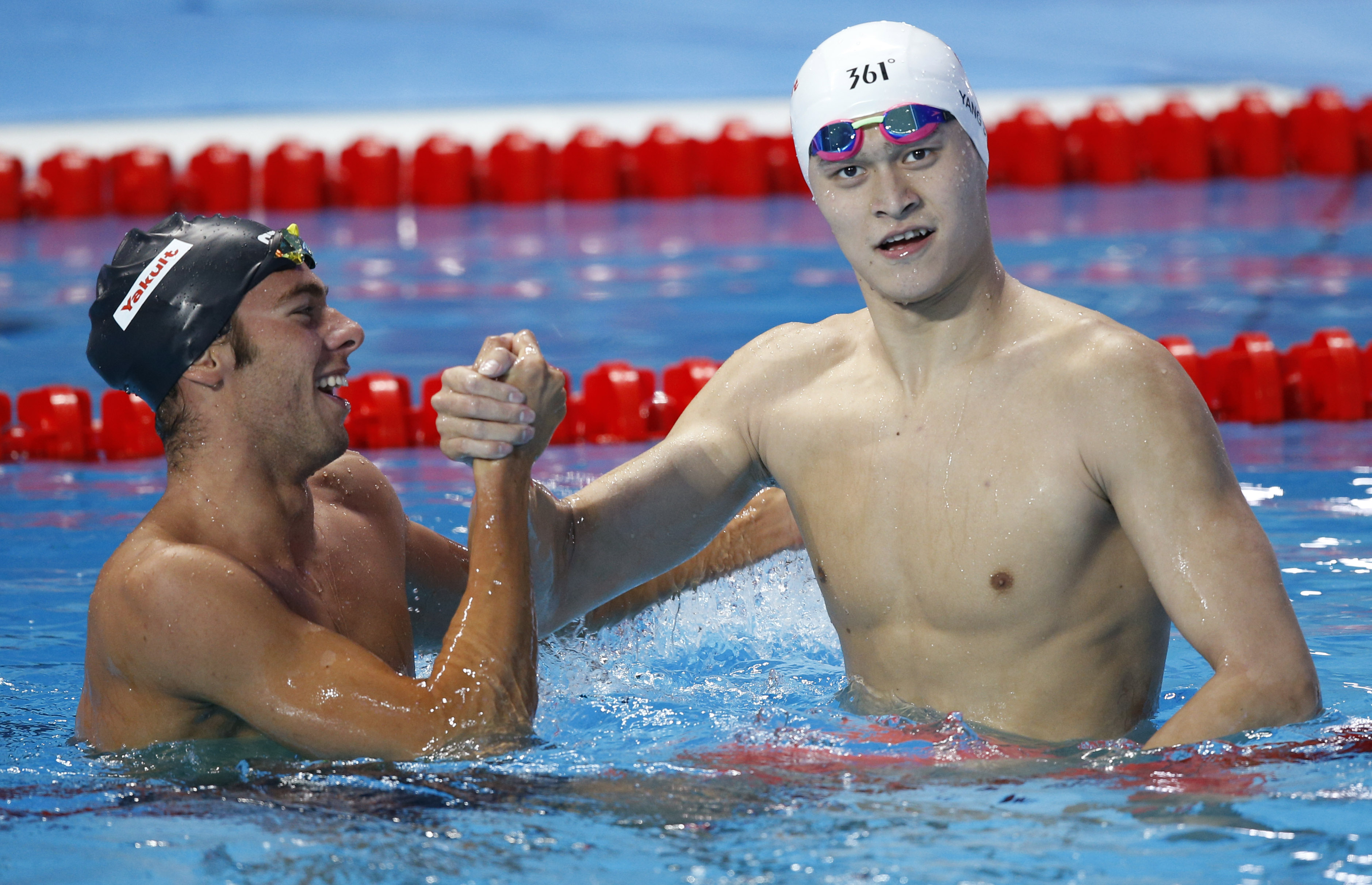 China's gold medal winner Sun Yang (right) is congratulated by Italy's Gregorio Paltrinieri after the men's 800m freestyle final at the Swimming World Championships in Kazan. Photo: AP