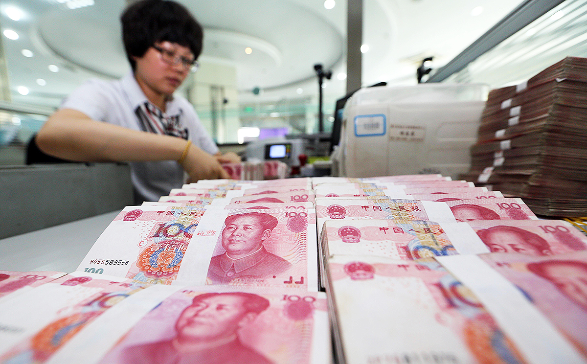China's move to devalue the yuan came after data showed exports fell 8.3 per cent last month. Photo: AFP