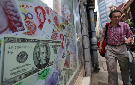 China allowed the yuan to fall nearly 2 per cent against the US dollar on Tuesday and by a further 1.6 per cent on Wednesay. Photo: EPA