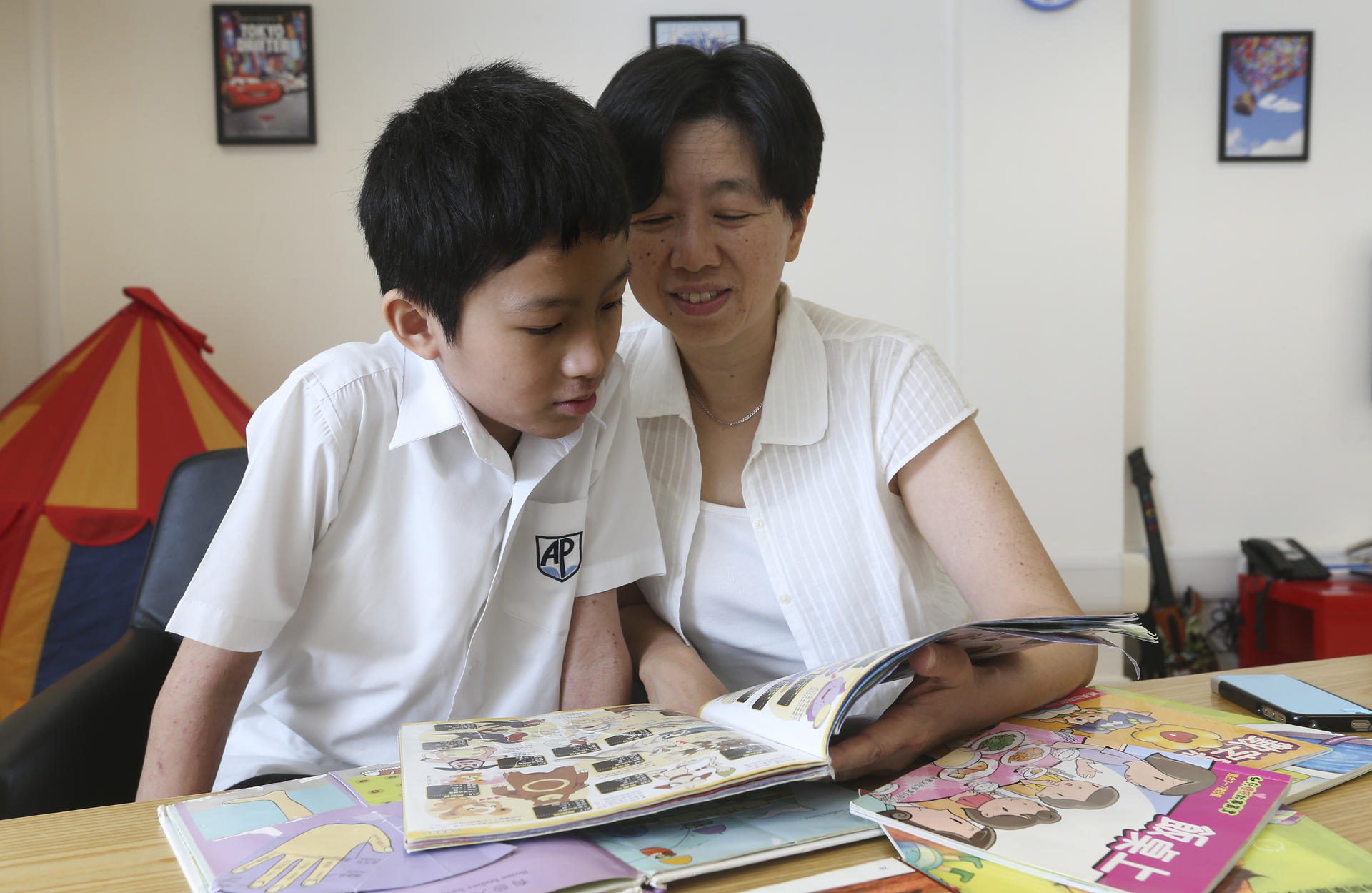 Josephine Cheung and her son Ah Ching at Aoi Pui School. Photo: K.Y.Cheng