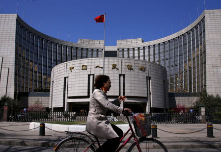 The People's Bank of China has retained the right to intervene directly in the market. Photo: Reuters