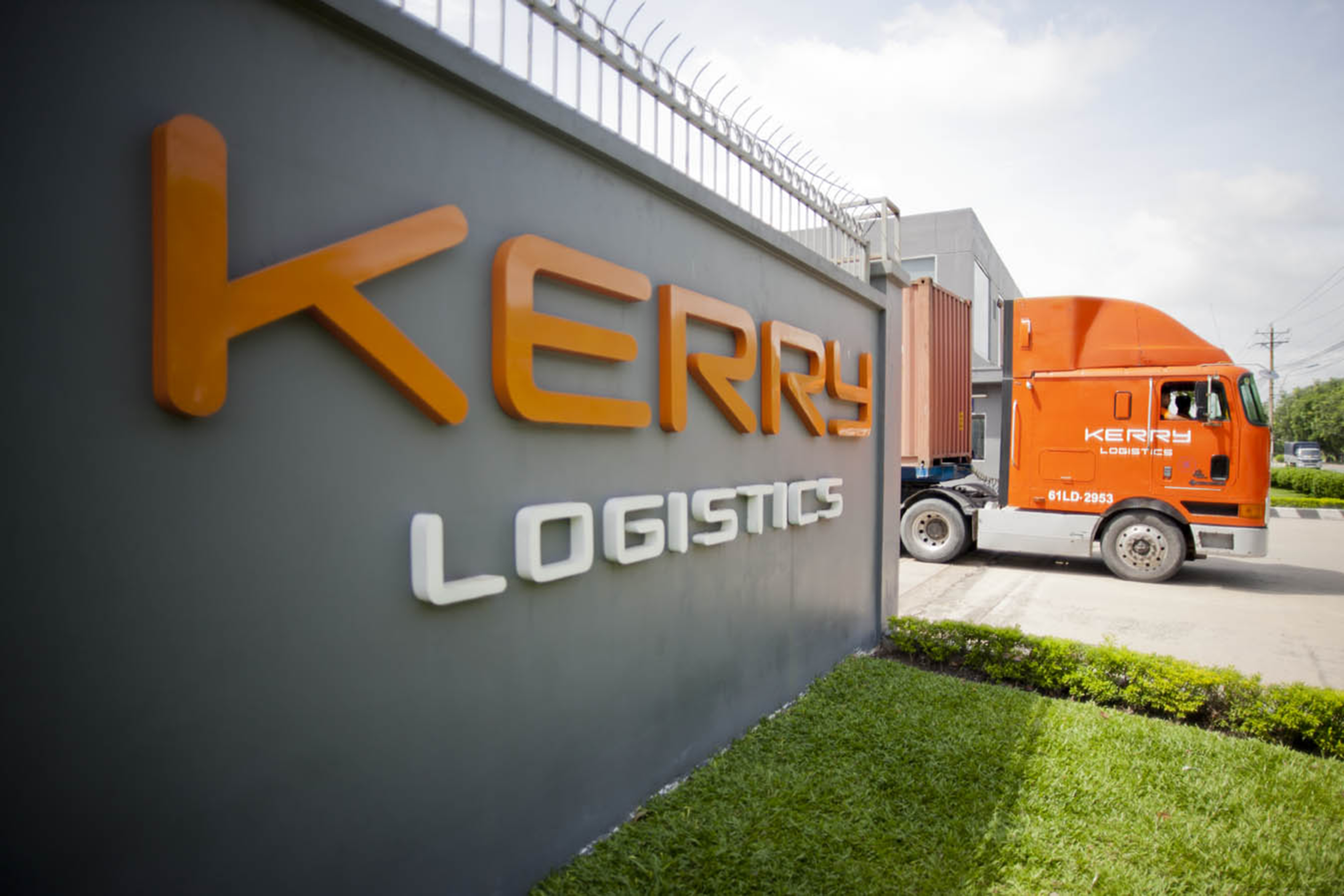 Kerry Logistics trucks moving out of their plant to deliver packages as the company growth in its net profit for the first half of the year. Photo: SCMP Pictures