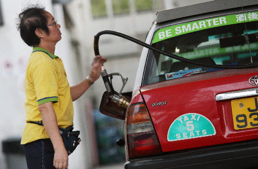Raising the price of petrol sends a message that the fuel is non-renewable. Photo: Martin Chan