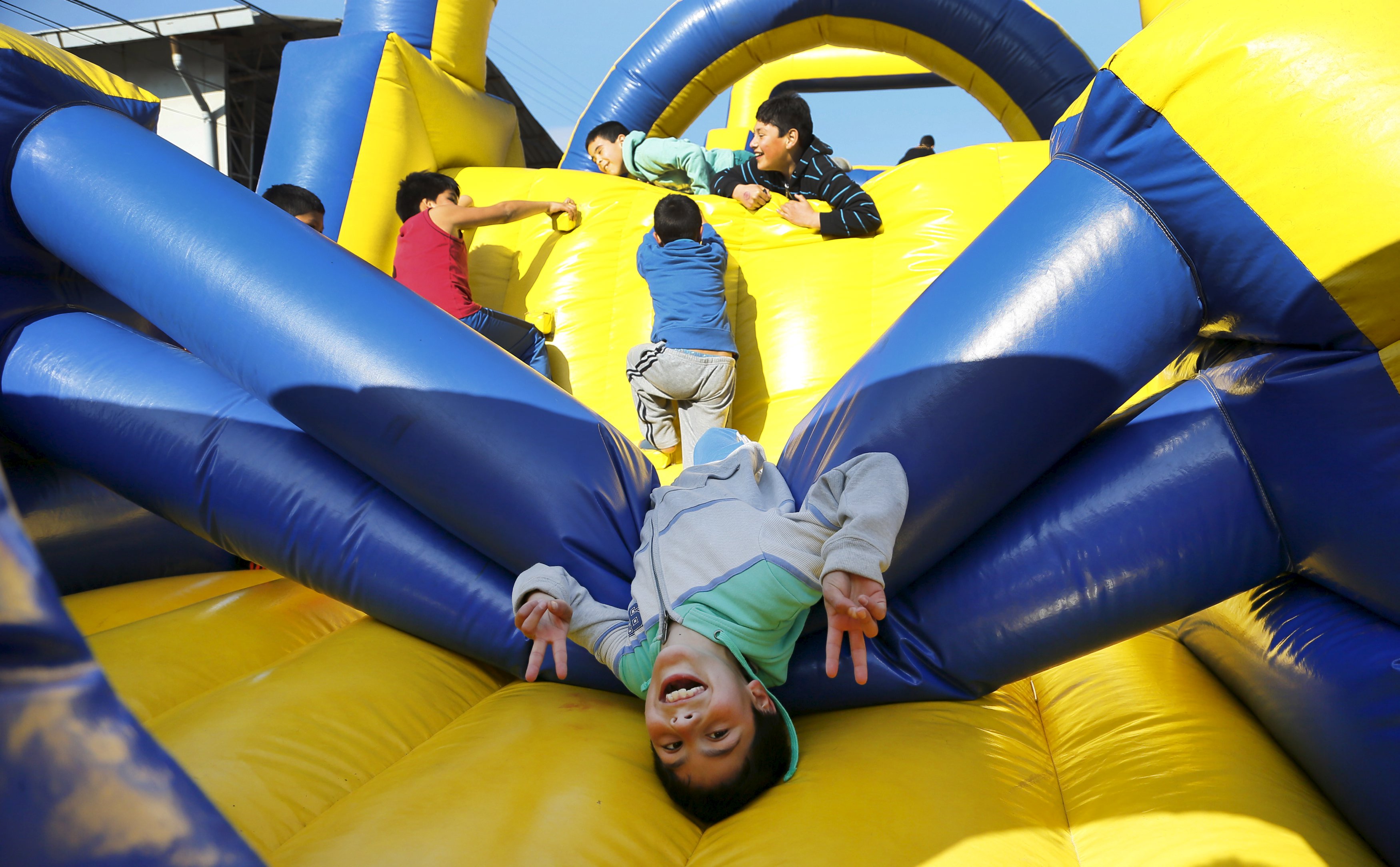 Children play at a public square in Valparaiso, Chile. Photo: Reuters
