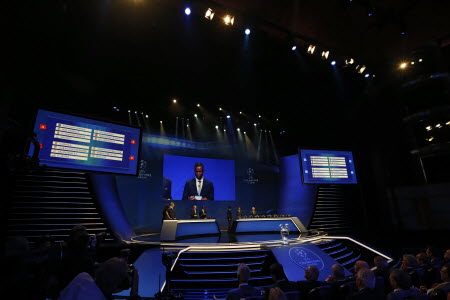Former French football player Eric Abidal (screen) takes part in the Uefa Champions League group stage draw in Monaco.  Photos: AFP 