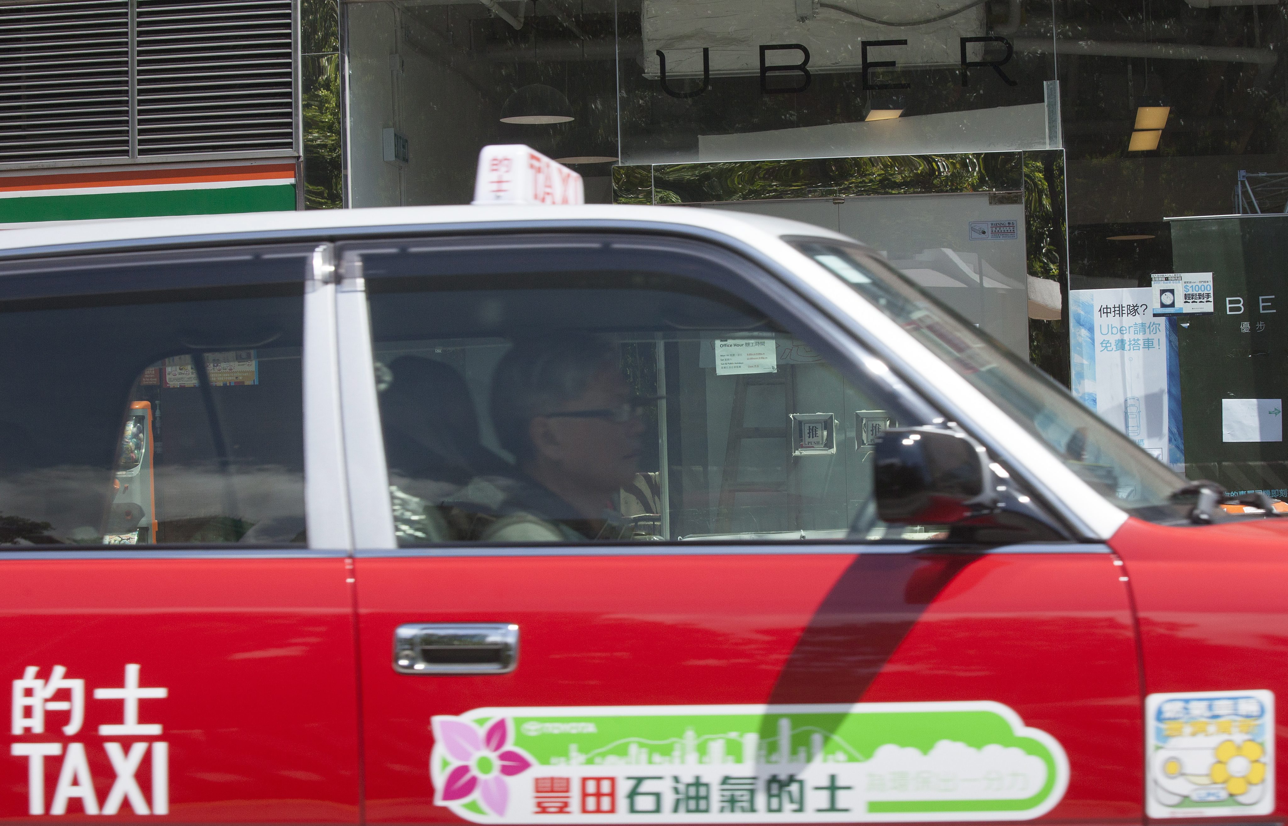 The traditional taxi industry and car-hailing-app companies like Uber are complementary and can co-exist. Photo: EPA