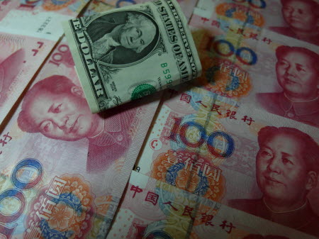 By adopting a free-market exchange-rate regime like the currency board system in Hong Kong, Beijing would dump instability and embrace stability. Photo: AFP