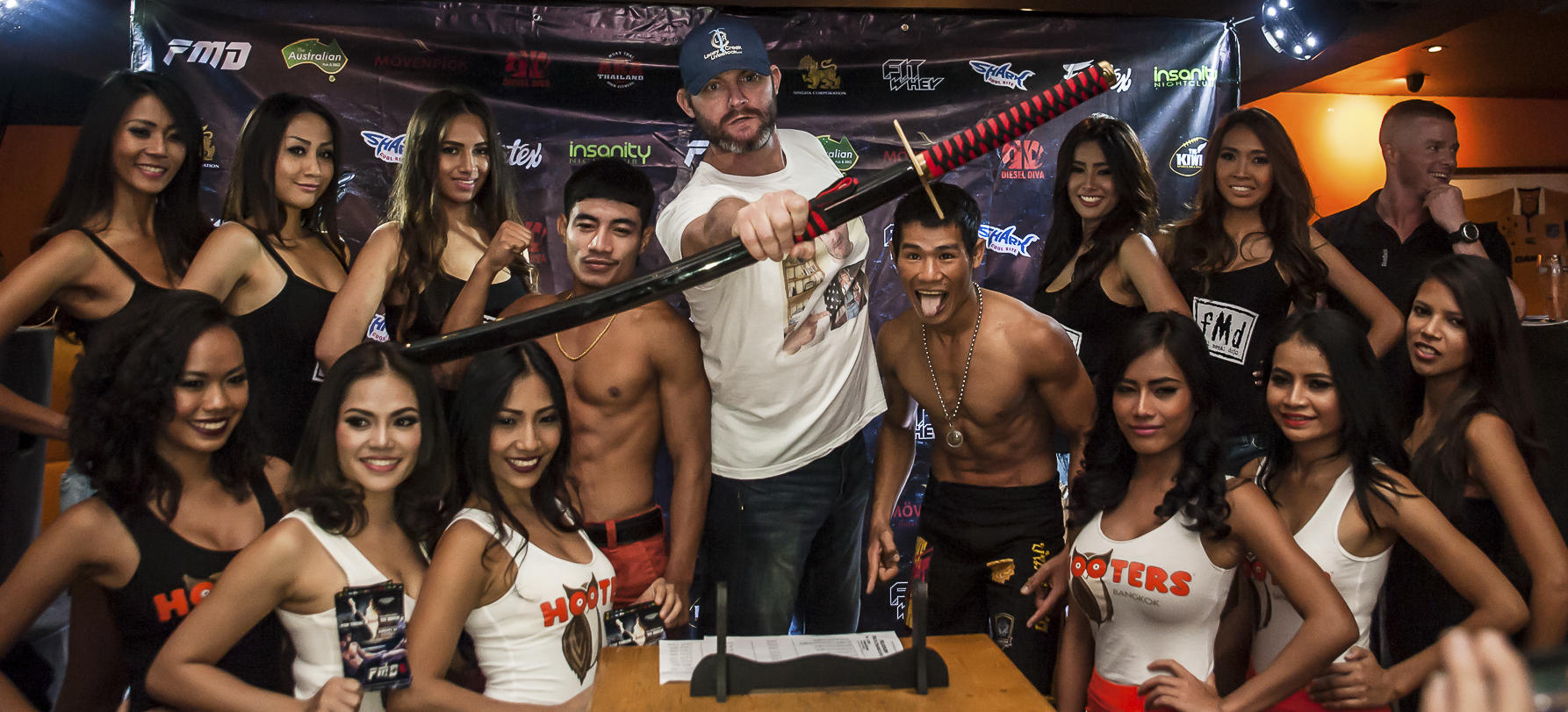 Jon Nutt (centre, with sword) and members of the Full Metal Dojo team in Bangkok, Thailand. 