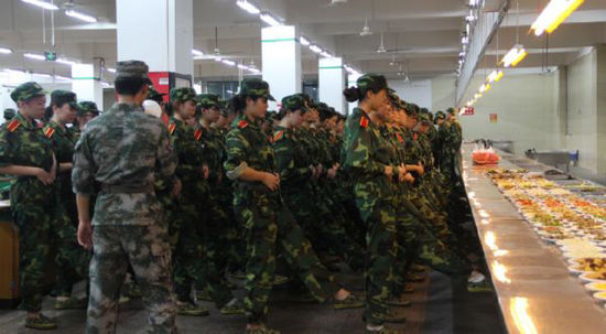 Hungry for knowledge: the students try to concentrate on their drill discipline in full view of their lunch. Photo: Thepaper
