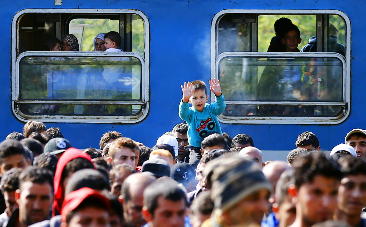 Refugees arrive at the railway station in 168 kms west from Budapest, Hungary on 21 September 2015. Photo: Reuters