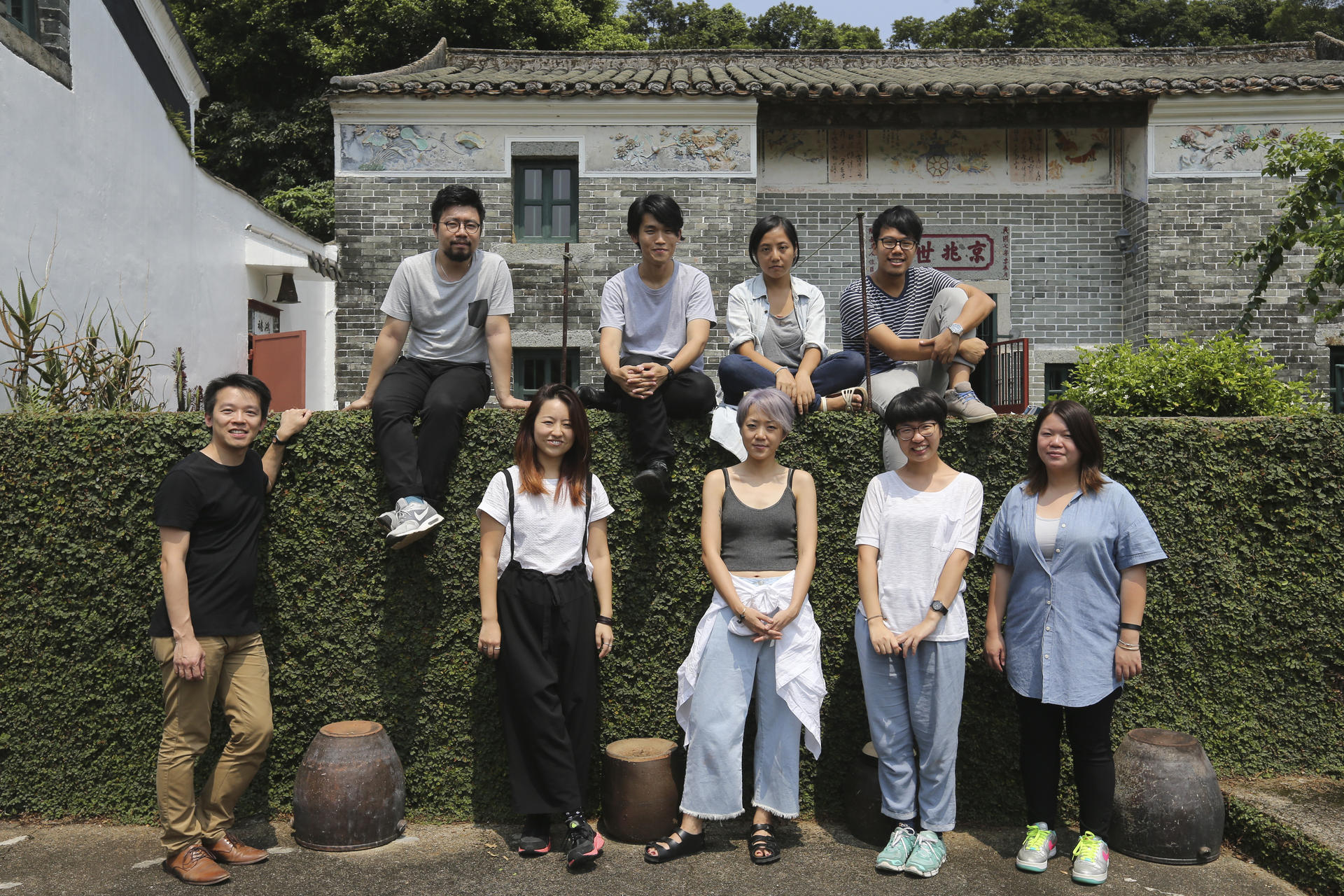 Alex Tam (front, left) with the Pak Sha O project team.