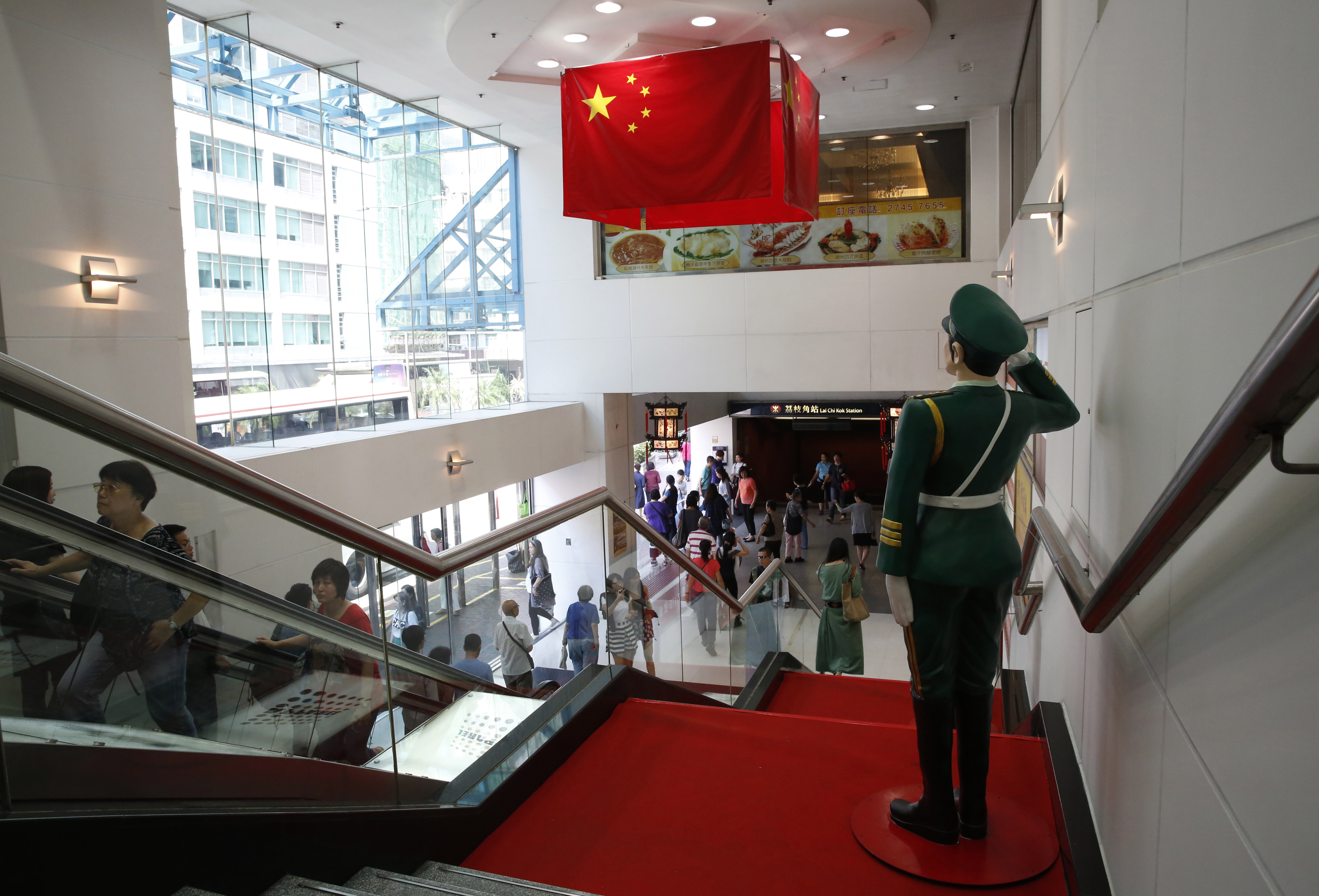 A statue of a People's Liberation Army officer is displayed in a Hong Kong shopping centre ahead of the National Day on October 1. Photo: AP