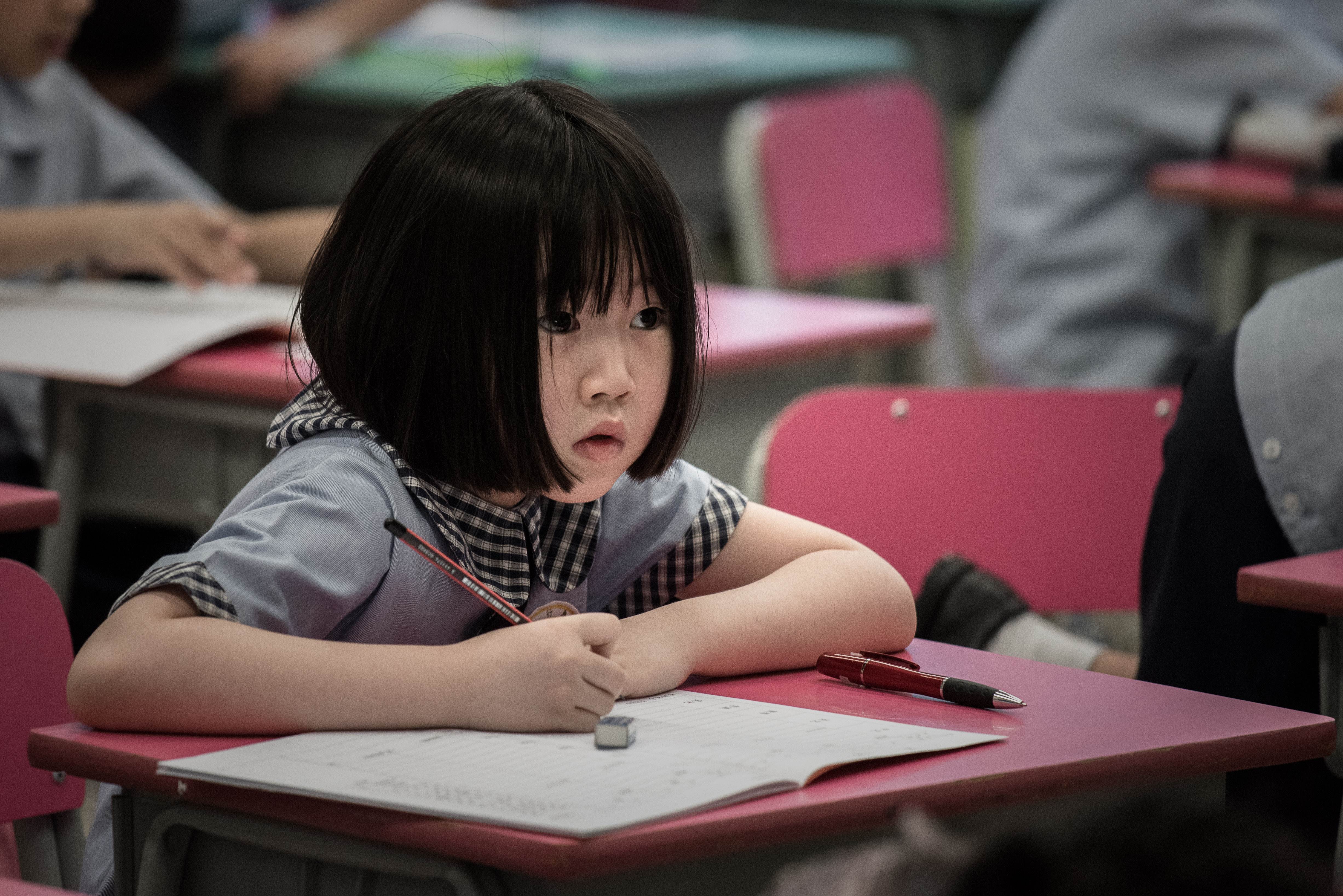 Hong Kong could research the nature of English proficiency and competence in today's globalised world, and develop innovative ways to teach them. Photo: AFP