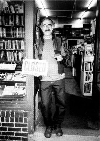 Adjunct professor Dave Heller at the bookstore where he worked part-time. Books were among his few possessions. Photo: Charles Fischer/Courtesy Seattle Magazine