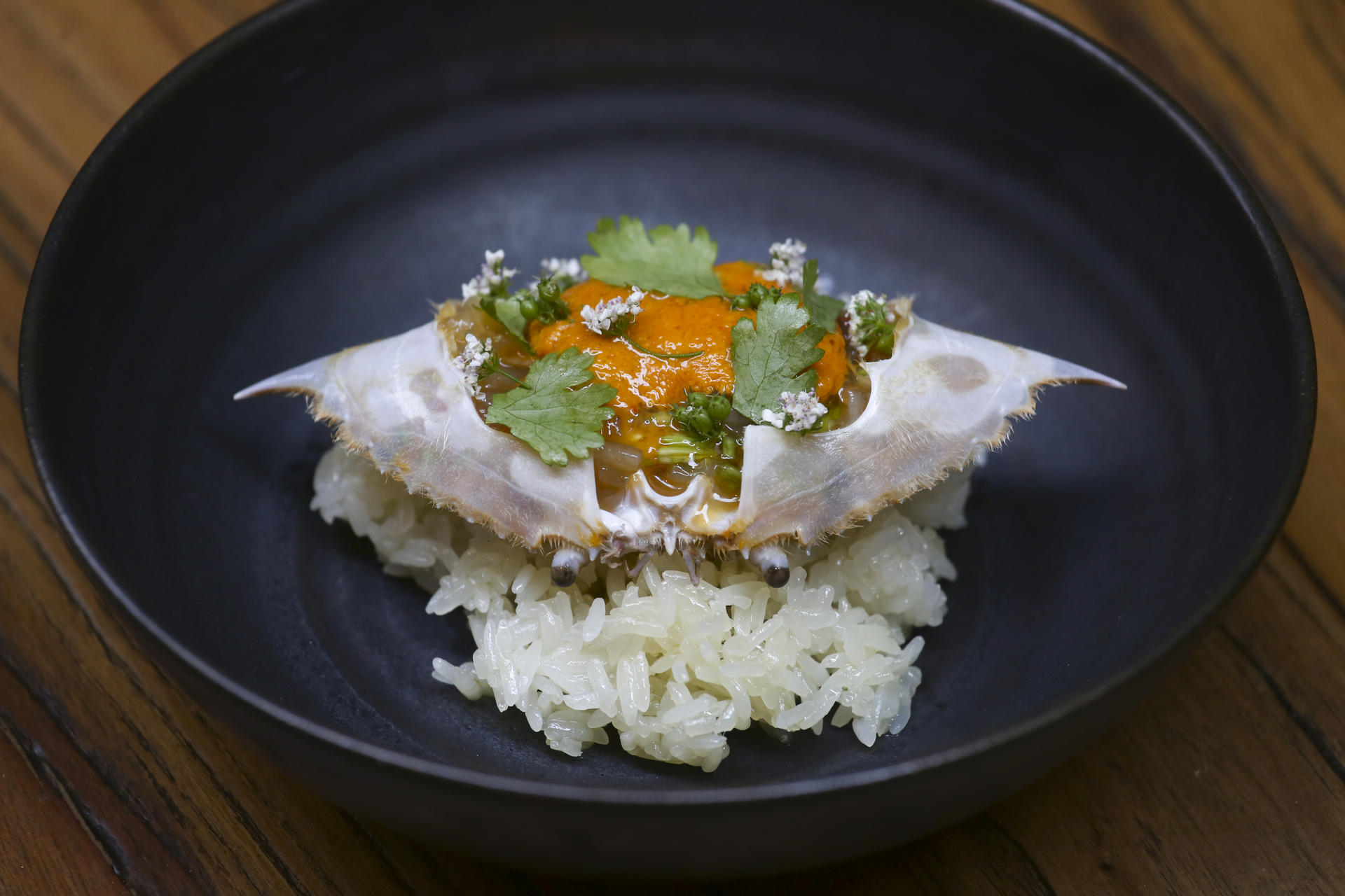 Chiu Chow marinated raw crab, sea urchin at Fish School. Photo: Jonathan Wong