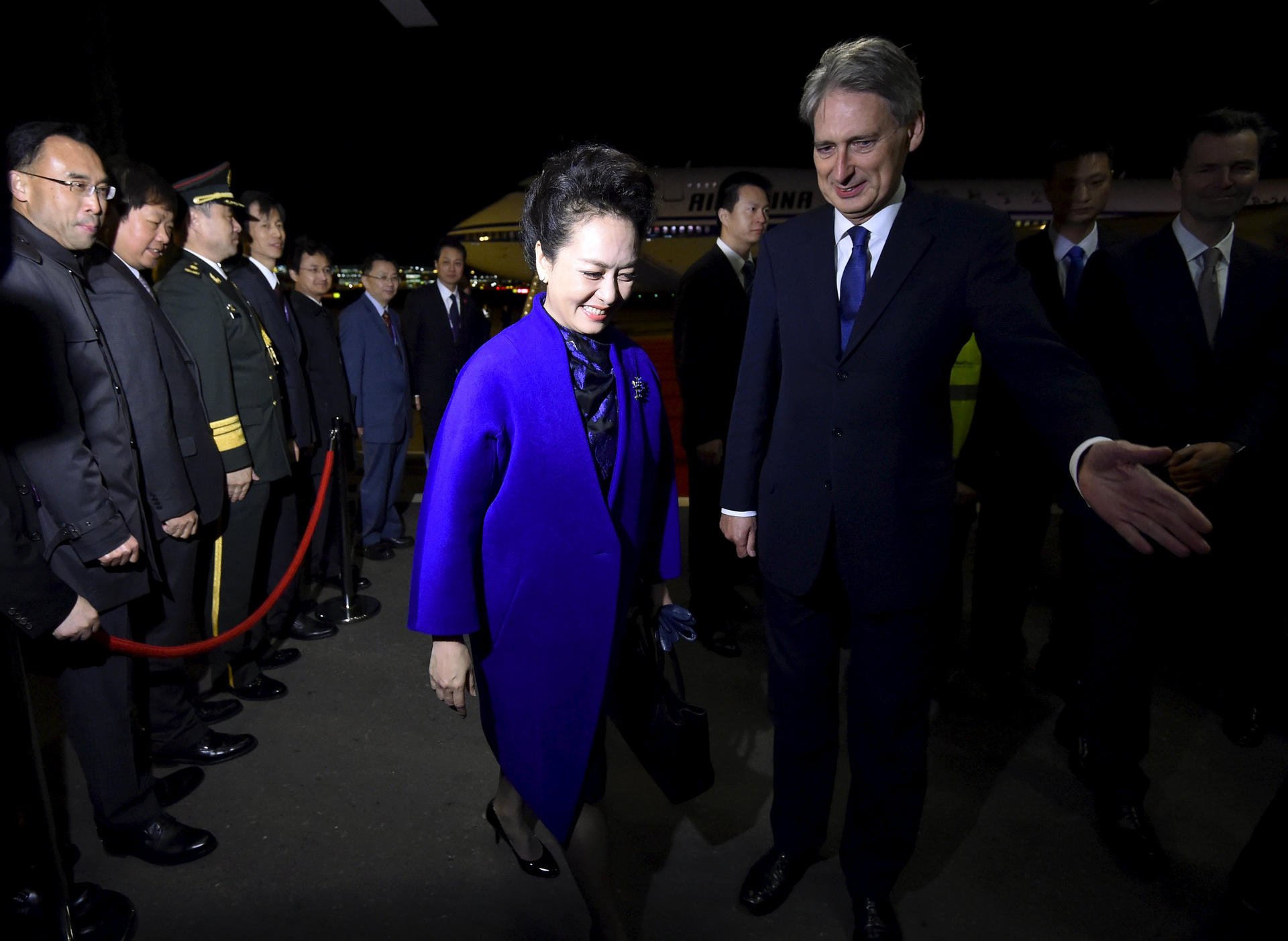 Peng Liyuan, wife of President Xi Jinping, was welcomed by British Foreign Secretary Philip Hammond during their state visit to the UK. In September, Hammond hailed a reform to Japan's self-defence laws that incensed Beijing. Photo: AP