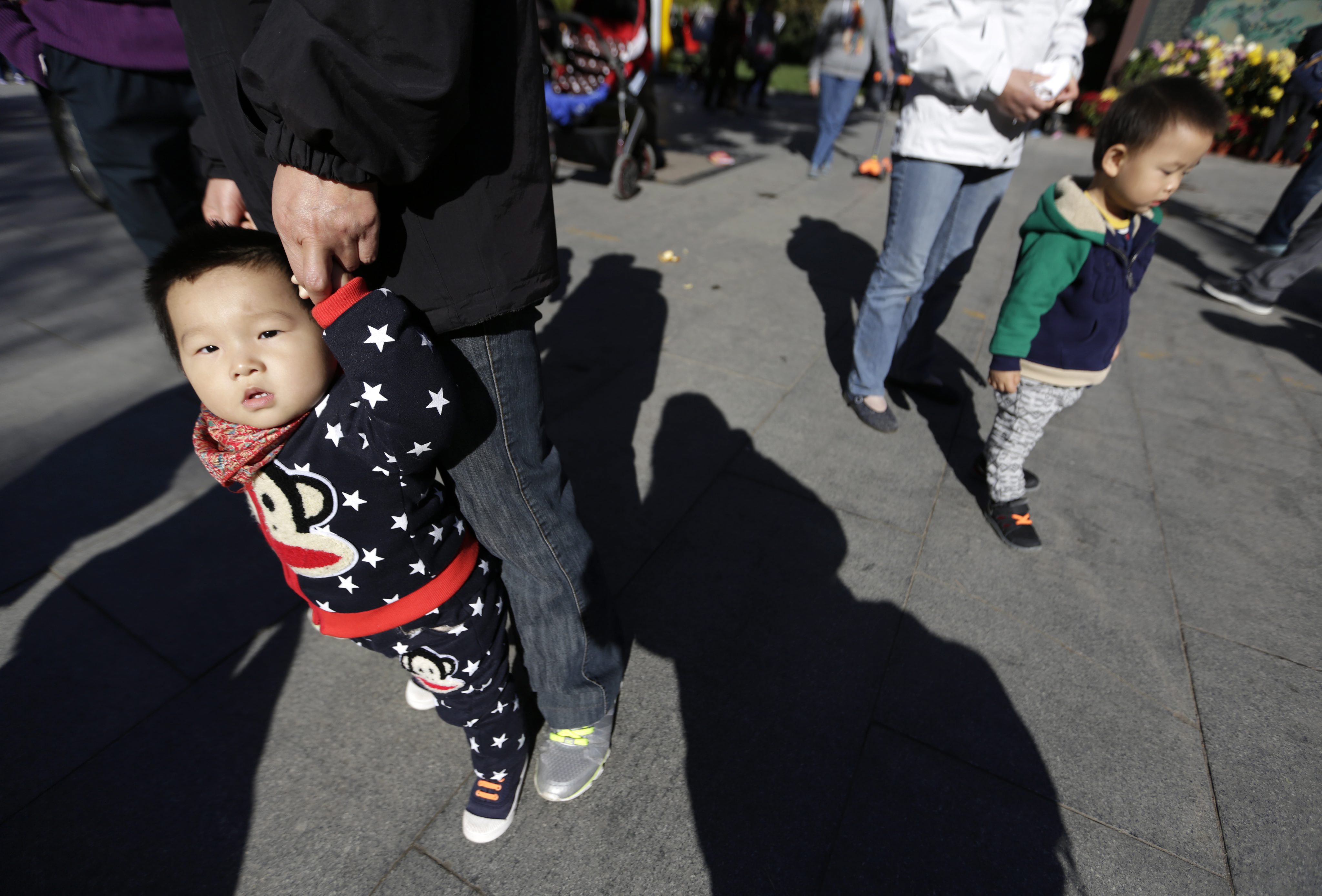 China's People’s Daily, the Communist Party’s mouthpiece, has tried to dampen  excitement about the one-child policy being abolished by saying there is still a long way to go. Photo: EPA