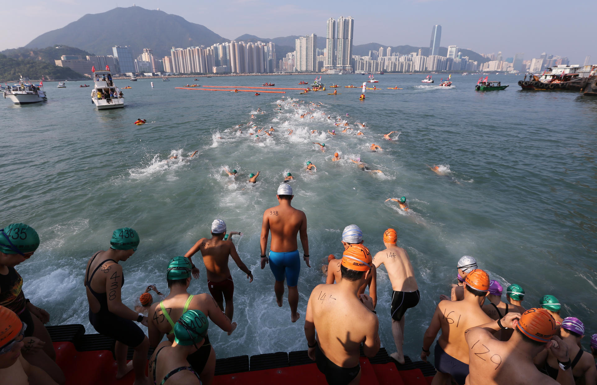 Swimmers compete again in the cross-harbour race, which was suspended for 33 years due to pollution. Photo: Sam Tsang