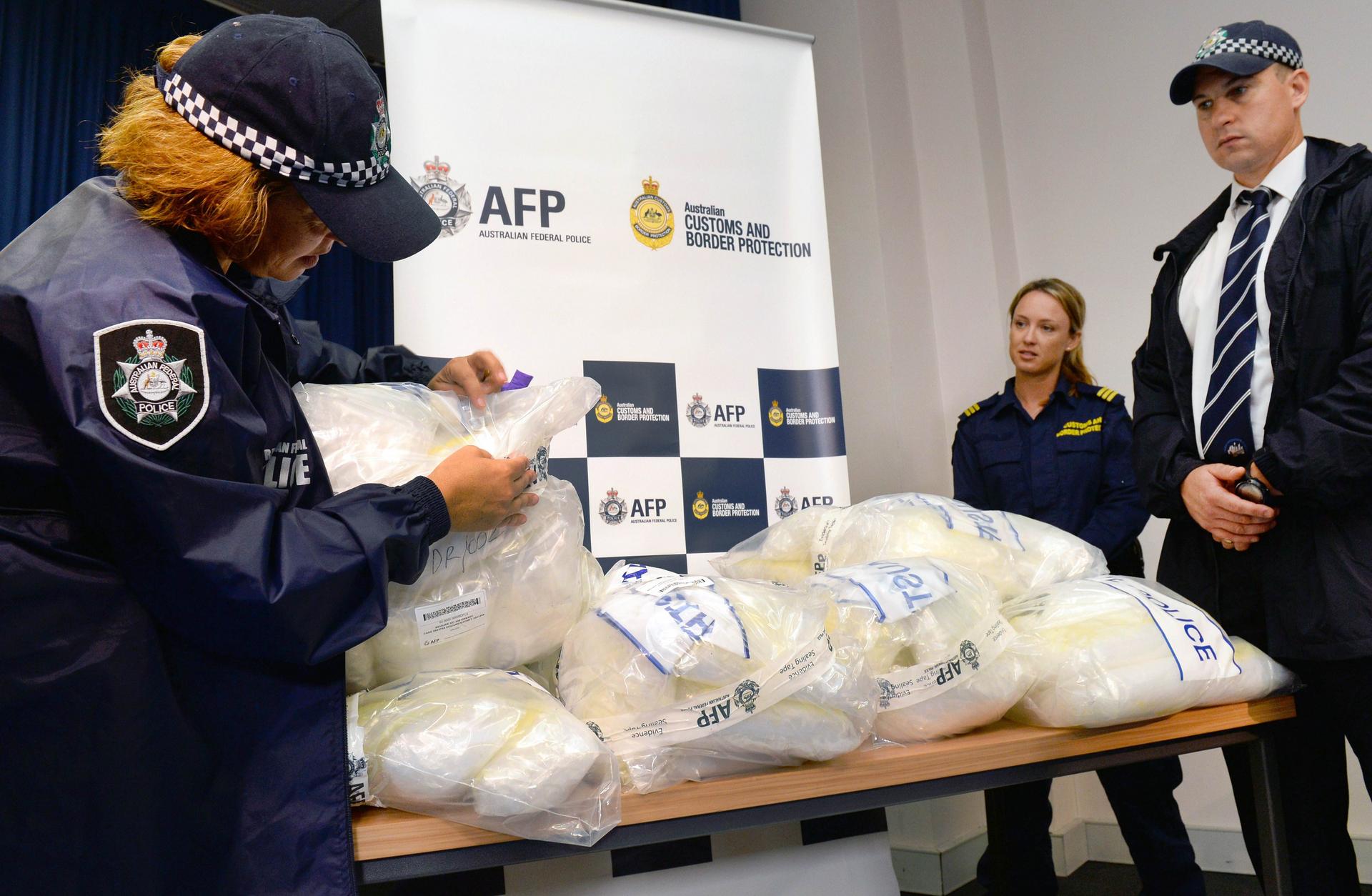 Australian police show off methamphetamine which had been hidden in kayaks from China. Photo: AFP