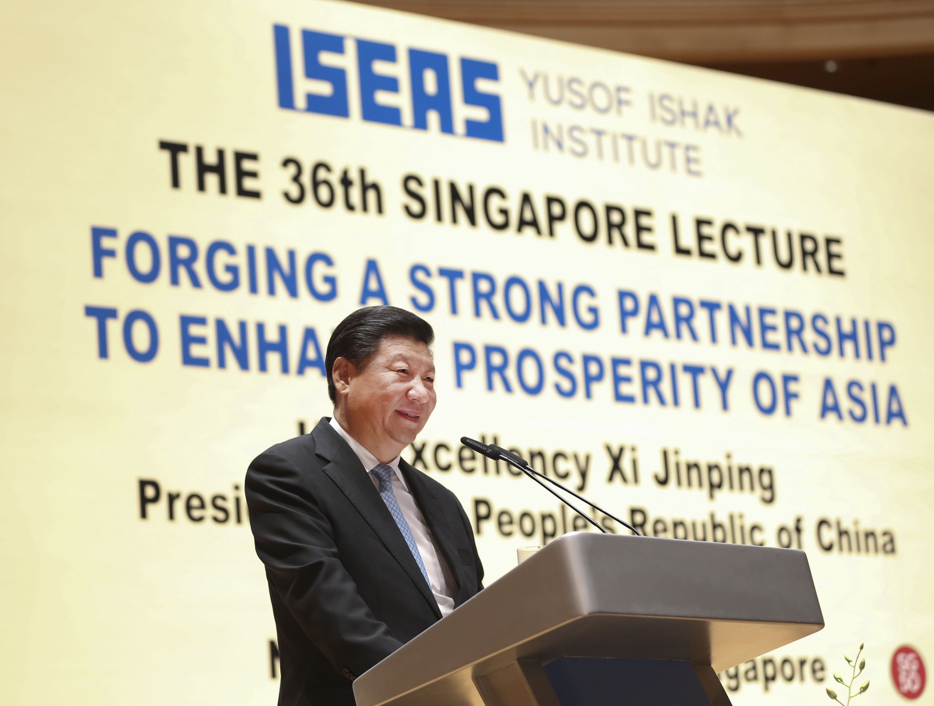 Chinese President Xi Jinping delivers a speech at the National University of Singapore. Asians must solve Asia's problems, he said. Photo: Xinhua 
