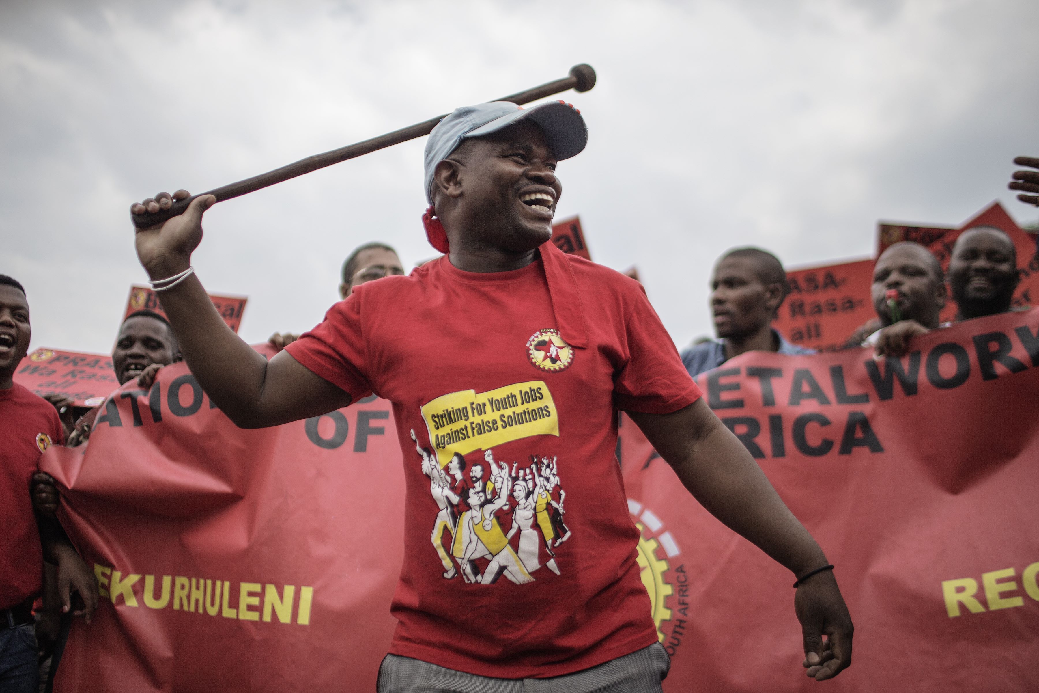 Activists from various civil society groups and trade unions march through the streets of Johannesburg, South Africa, against endemic corruption. Photo: AFP