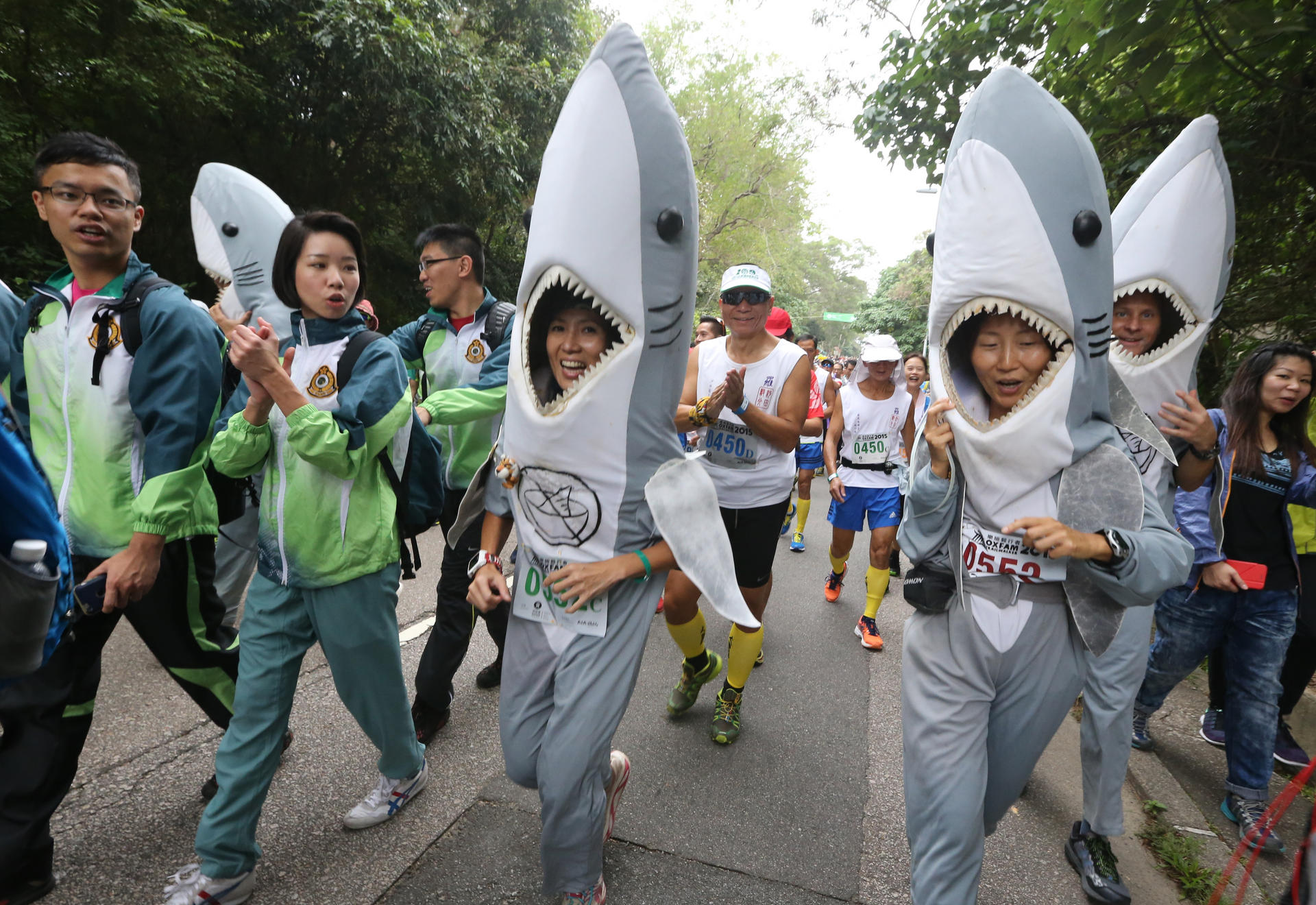 This year's Oxfam Trailwalker is "shark-infested", or so it would seem as participants gather at Pak Tam Chung in Sai Kung. Photo: Felix Wong