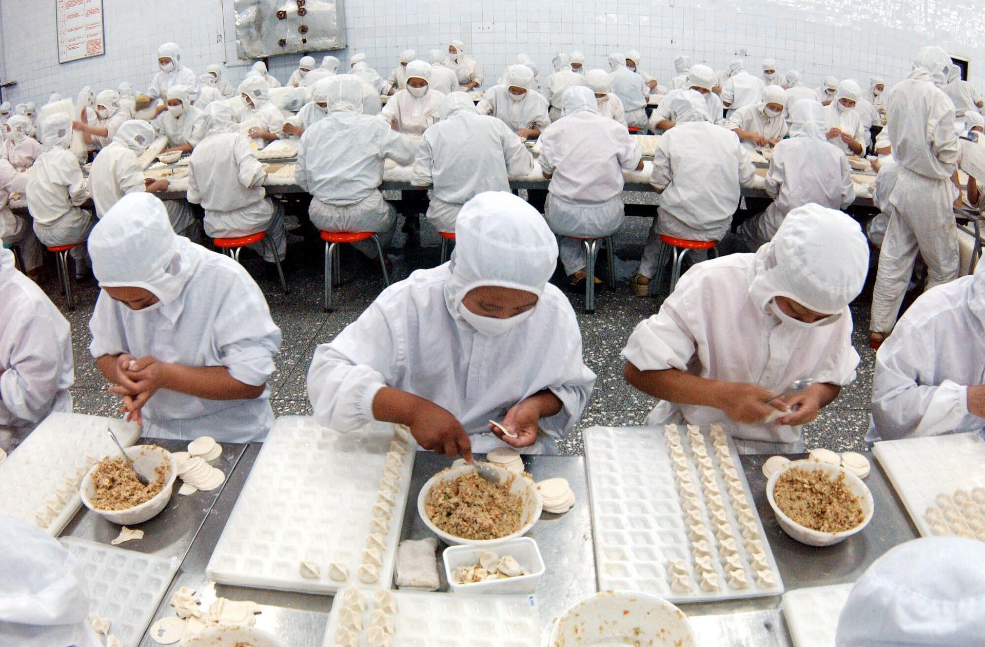 Zhengzhou's Sanquan Foods pump out hundreds of tons of frozen food each day for consumers.
