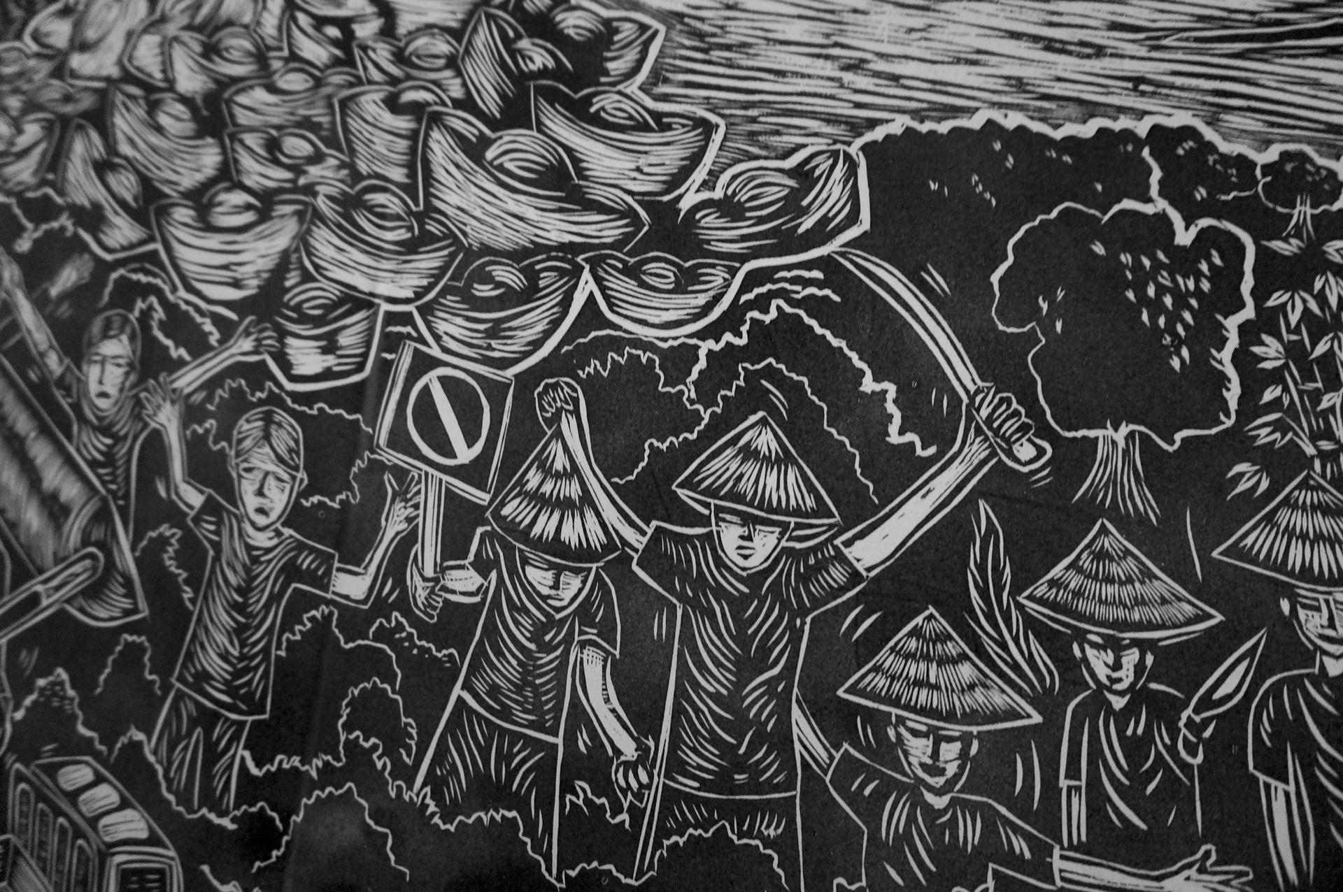 A woodcut print work by Pangrok Sulap depicts a protest against the Mamut Copper Mine work is political in nature. Photos: Nathan Thompson