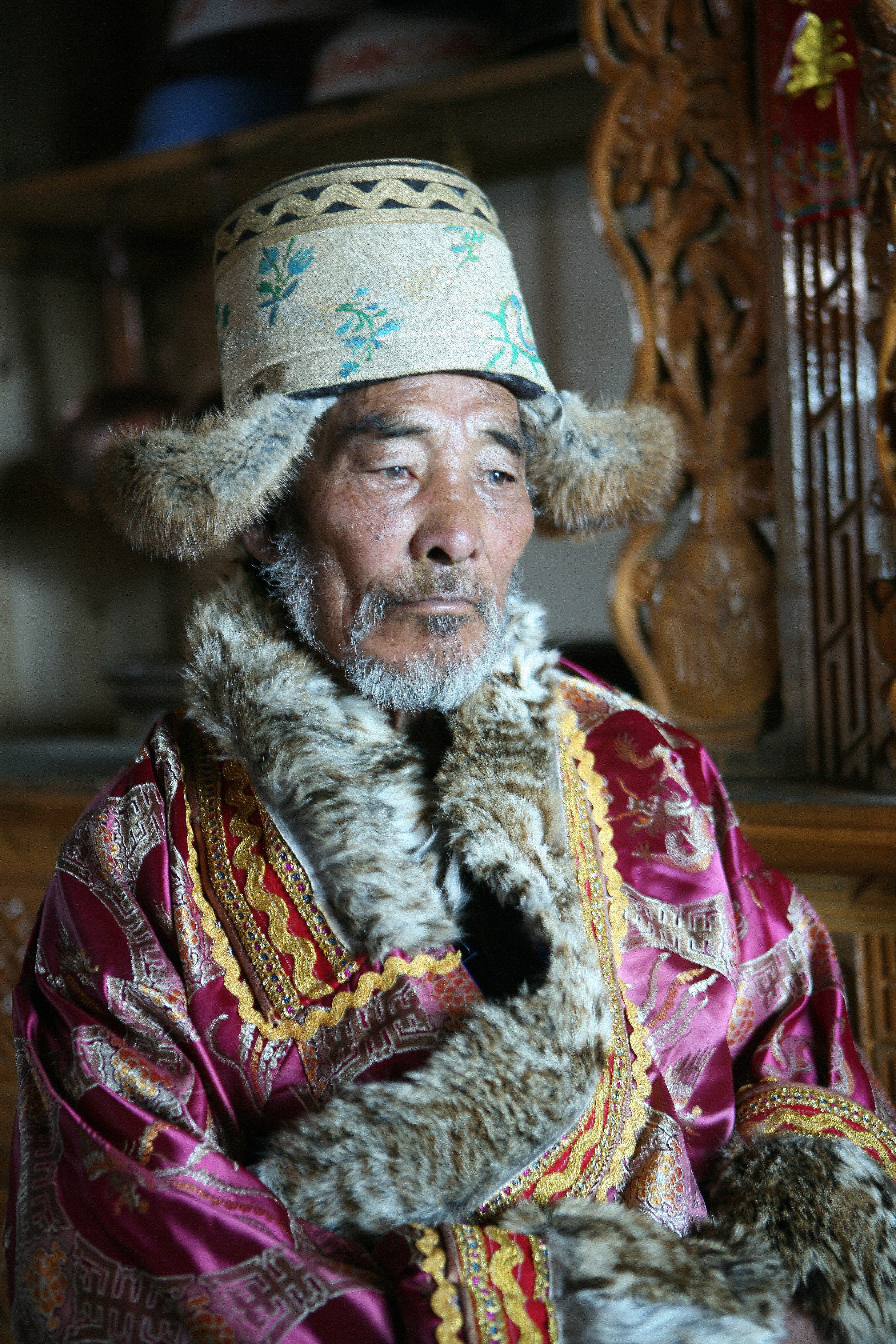 Denyoun Tsering, 80, one of the last remaining muleteers to have plied the Southern Silk Road, wearing his Tibetan clothes at home in Shangri-La, Yunnan. Photo: Paul Mooney 