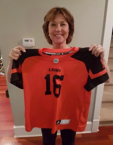 Premier Christy Clark posed for a selfie with a BC Lions jersey inside the house in which she is now a tenant of an associate of Vancouver Whitecaps' owner Greg Kerfoot. Photo: Twitter