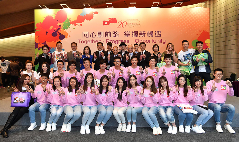 Chief Secretary for Administration Matthew Cheung Kin-chung (back row, seventh left) at the press conference announcing details of the 20th Anniversary celebration events and activities. With Mr Cheung are the singers of the Anniversary theme song; youth ambassadors; and other official guests.