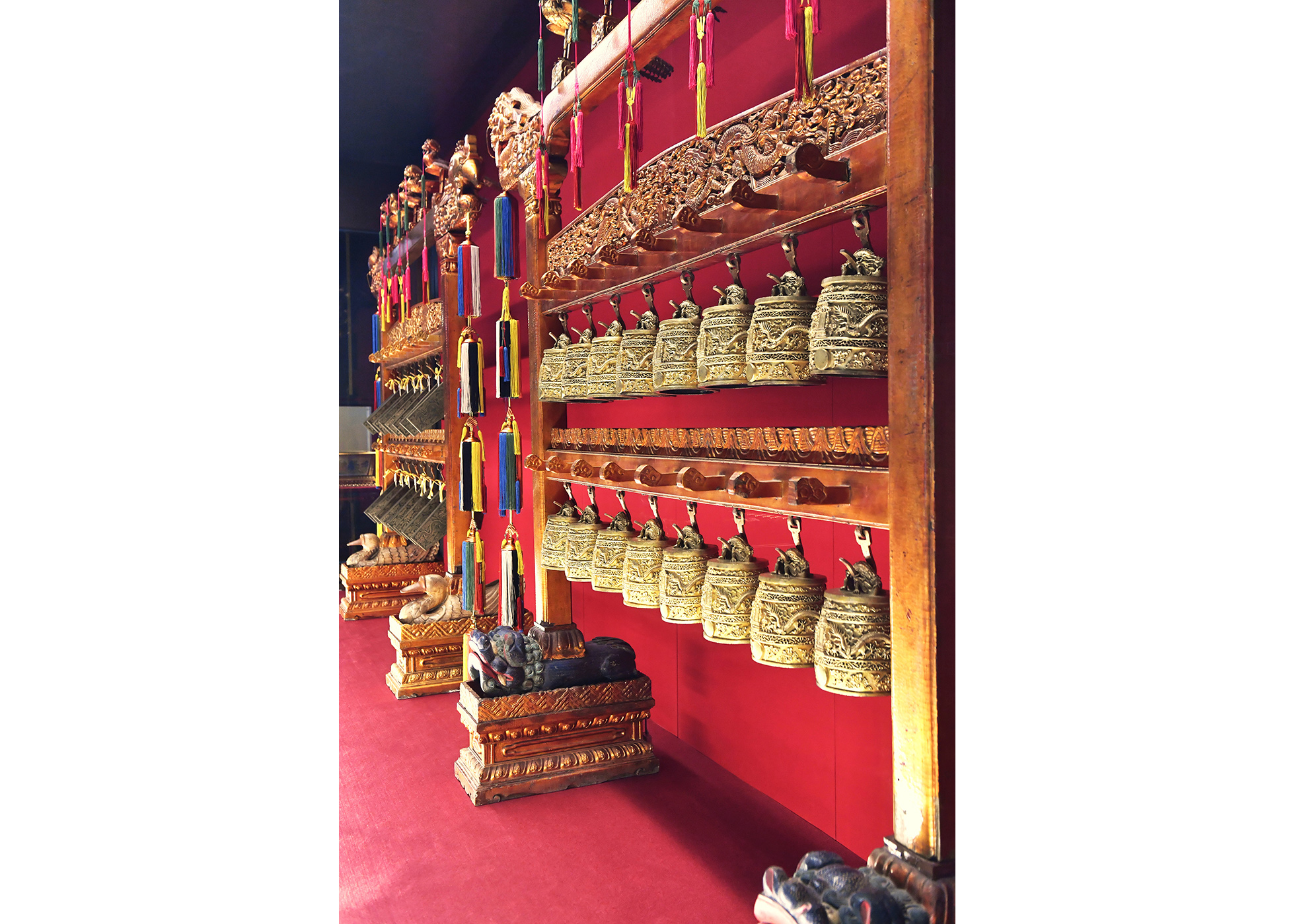 The deep green jade chimes and bronze bells used to play music for birthday celebrations in the Qing Court on display at the Hong Kong Museum of History.